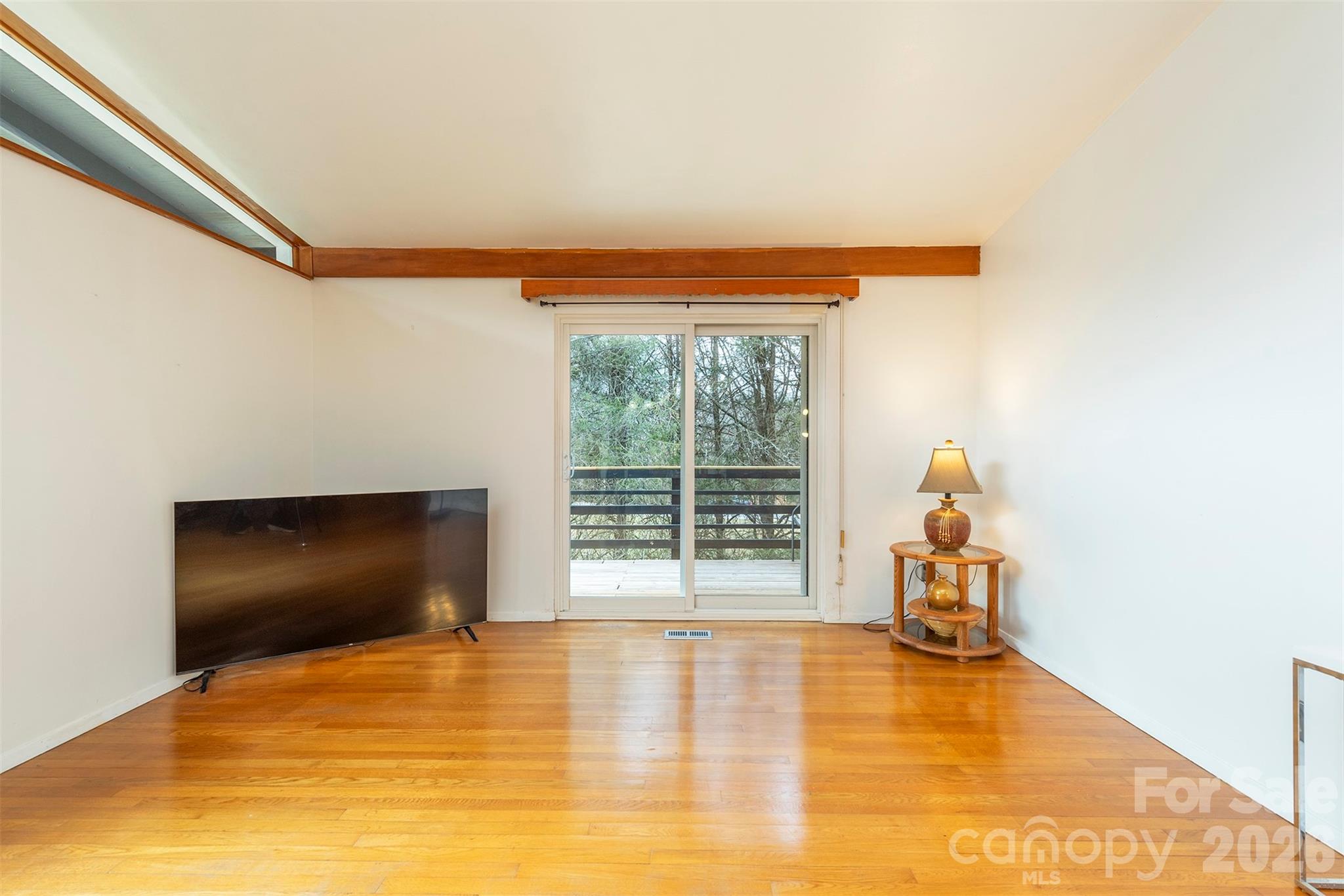 4 Stockwood Road Asheville, NC 28803 - Photo 9 of 41 a view of an empty room with a window