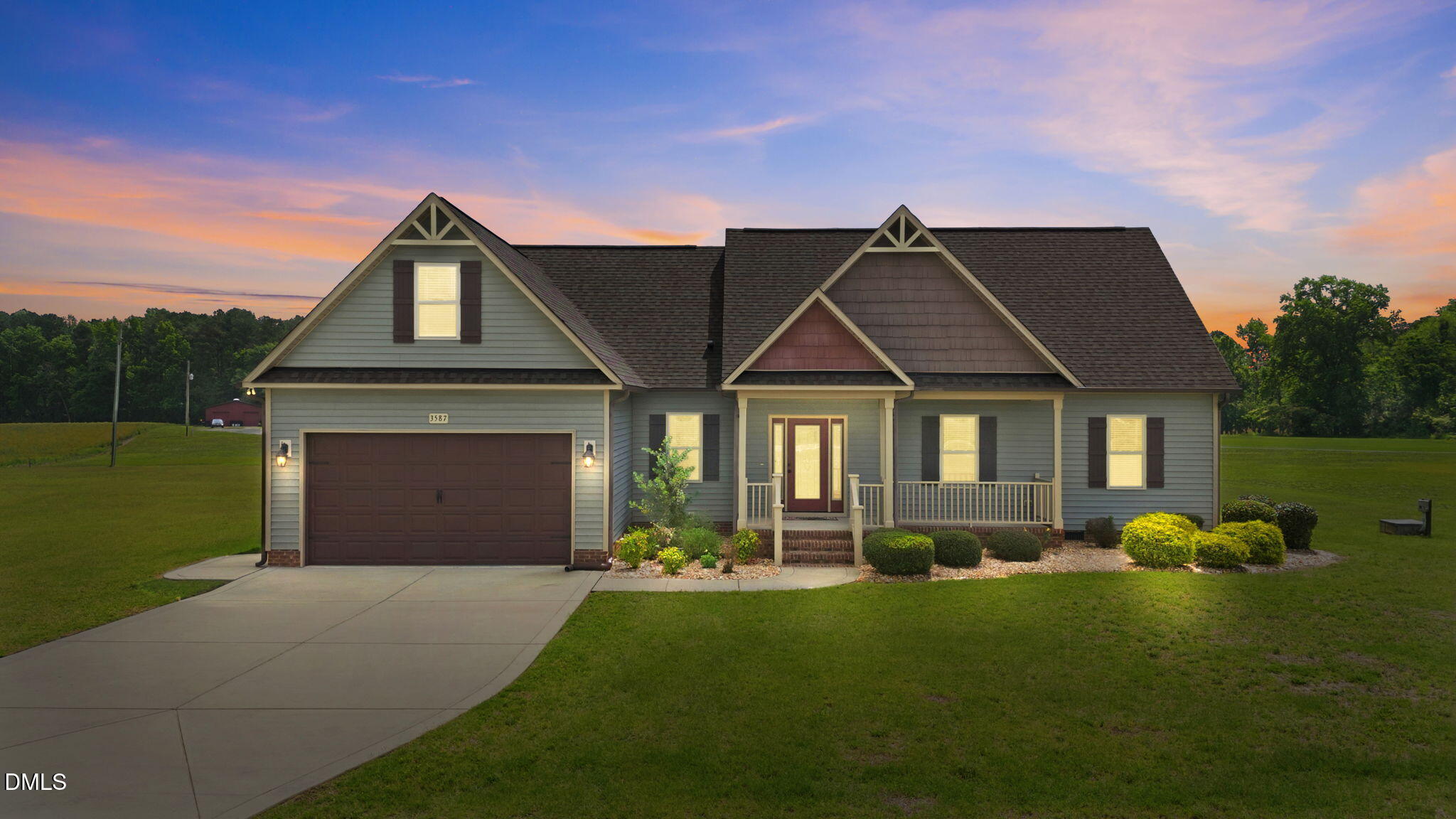 3587 Hannah Creek Road Benson, NC 27504 - Photo 2 of 43 a front view of a house with garden