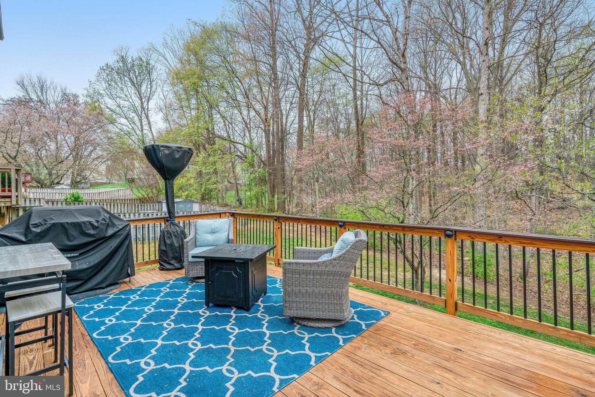 7924 Forest Path Way Springfield, VA 22153 - Photo 15 of 42 a view of a balcony with chairs