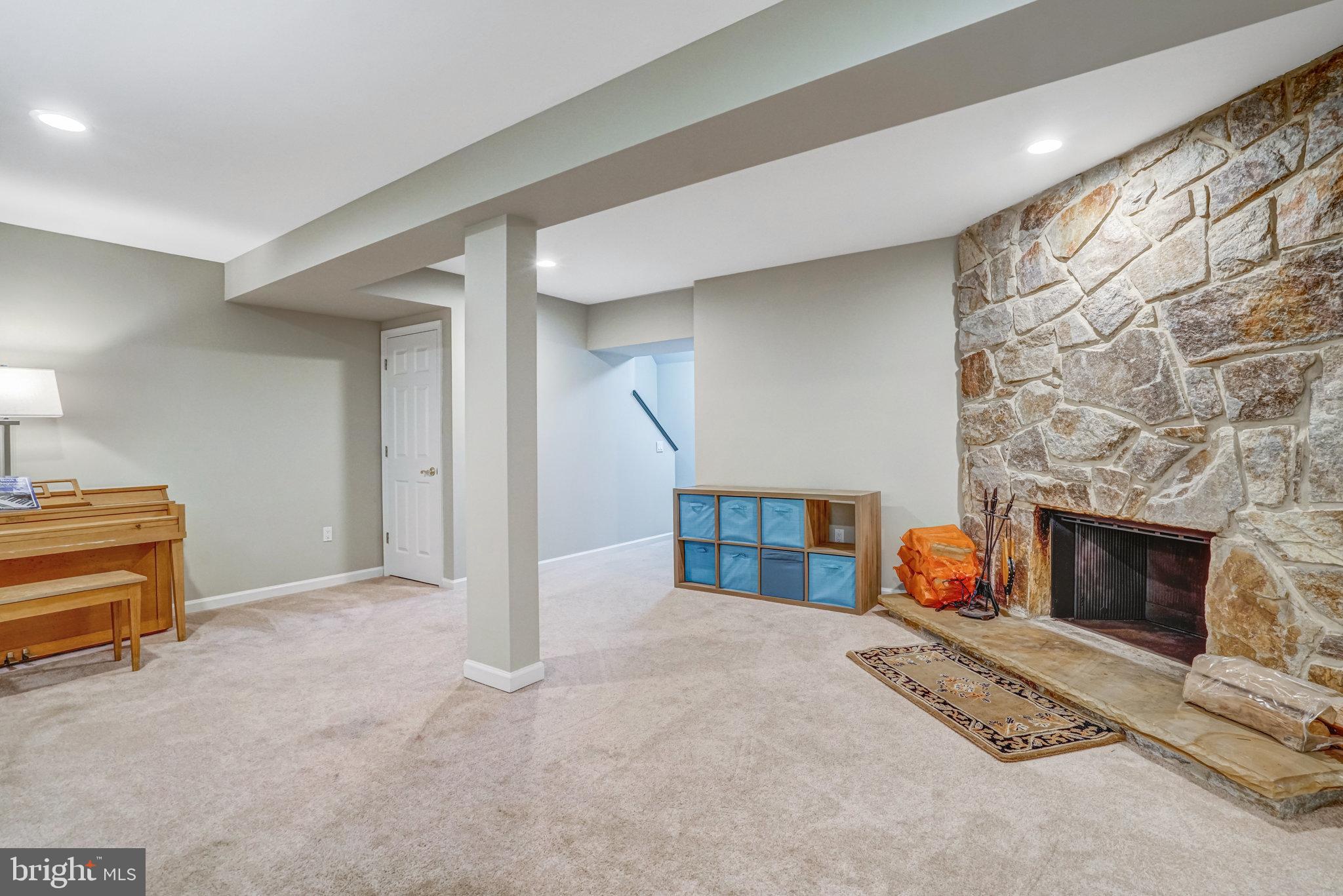 7924 Forest Path Way Springfield, VA 22153 - Photo 33 of 42 a view of a livingroom with a fireplace