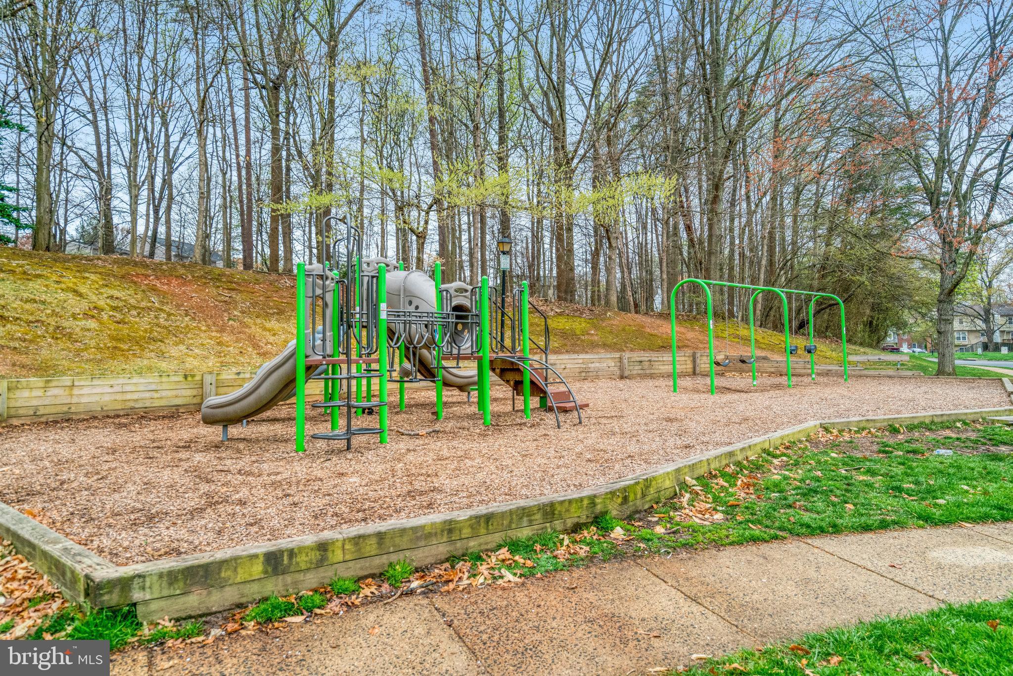 7924 Forest Path Way Springfield, VA 22153 - Photo 41 of 42 a view of a park with swings and slides