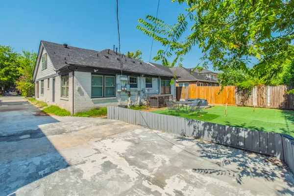 a swimming pool with wooden fence