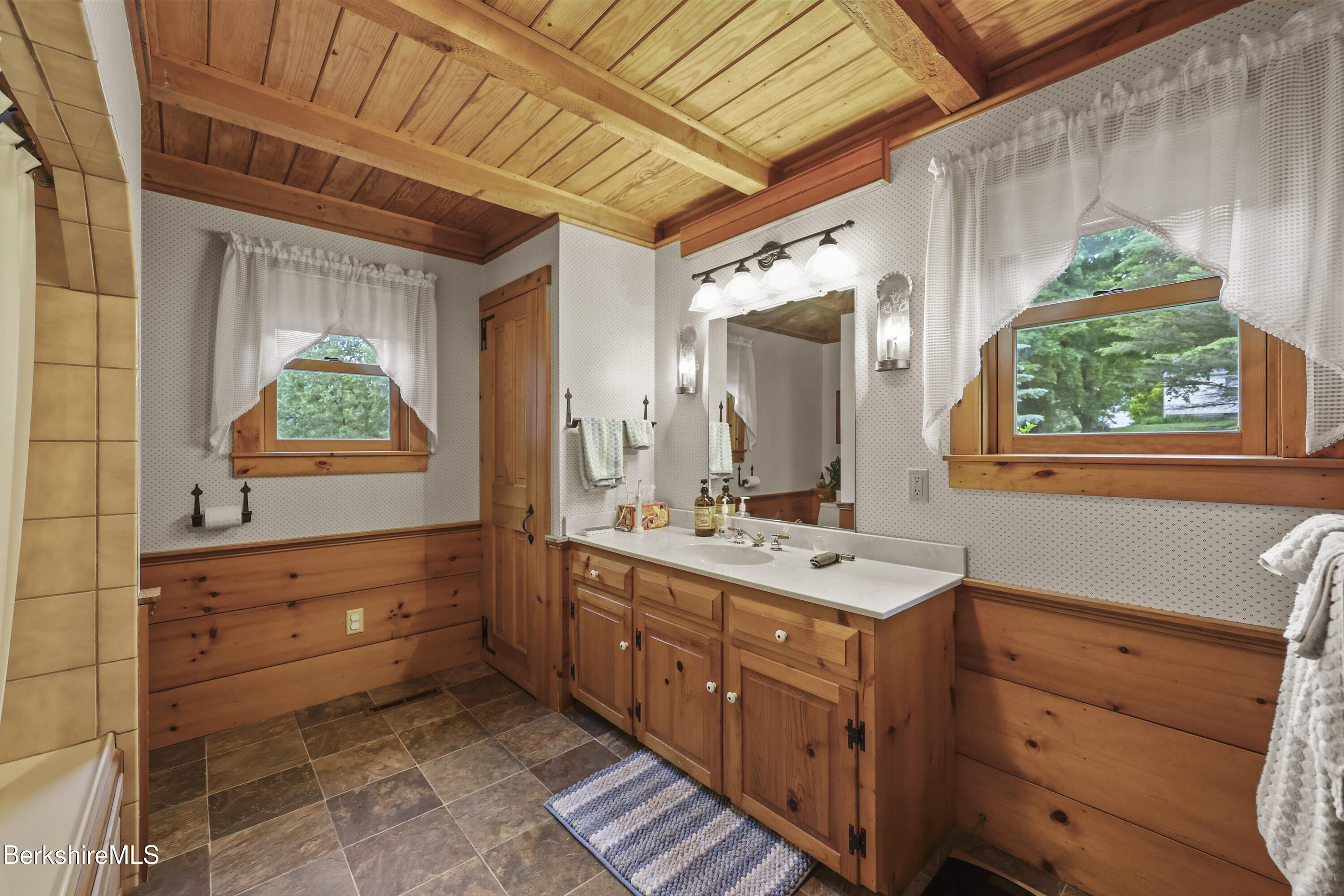 135 East Street Lee, MA 01238 - Photo 26 of 49 a bathroom with a double vanity sink and a mirror