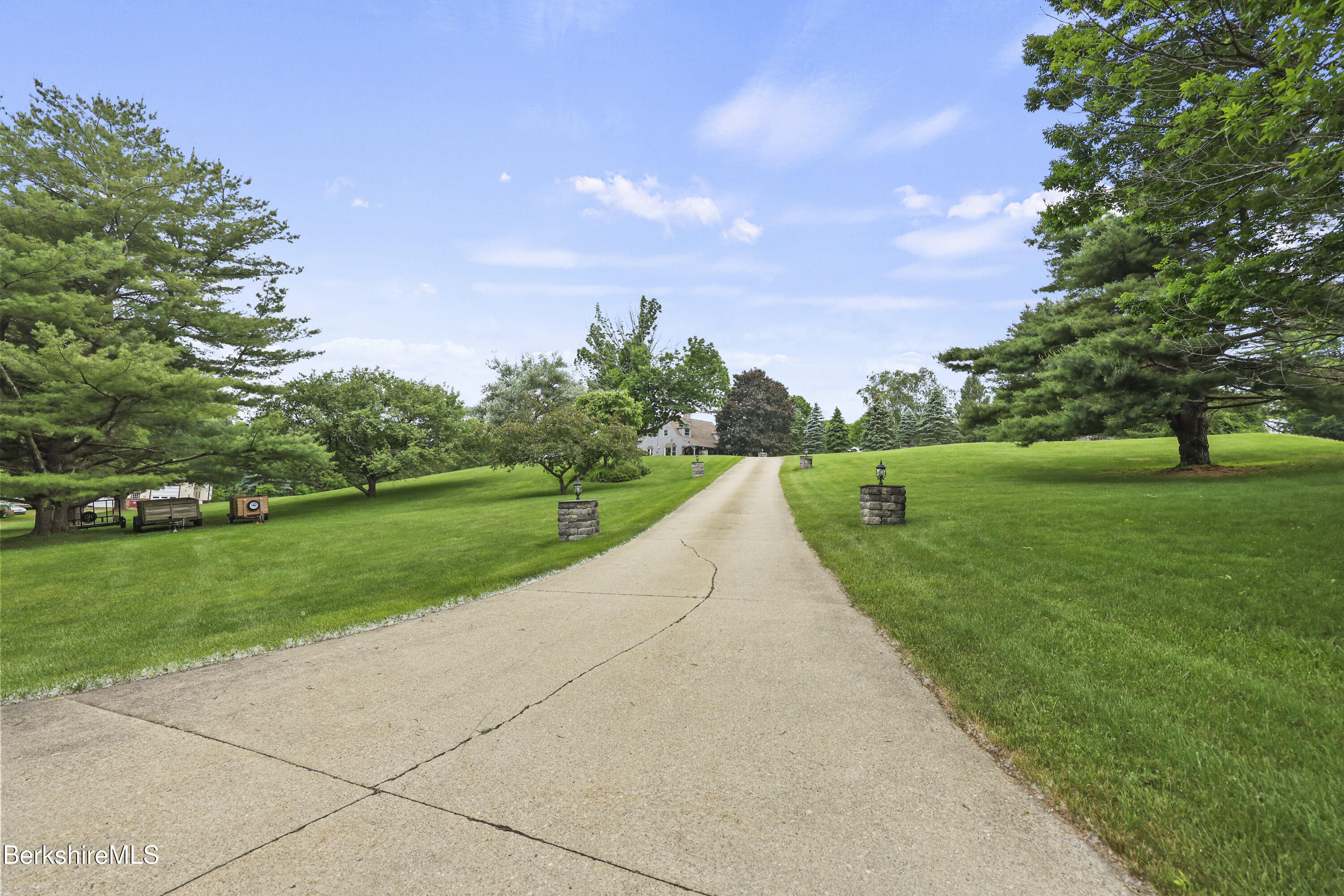 135 East Street Lee, MA 01238 - Photo 3 of 49 a view of a park with large trees
