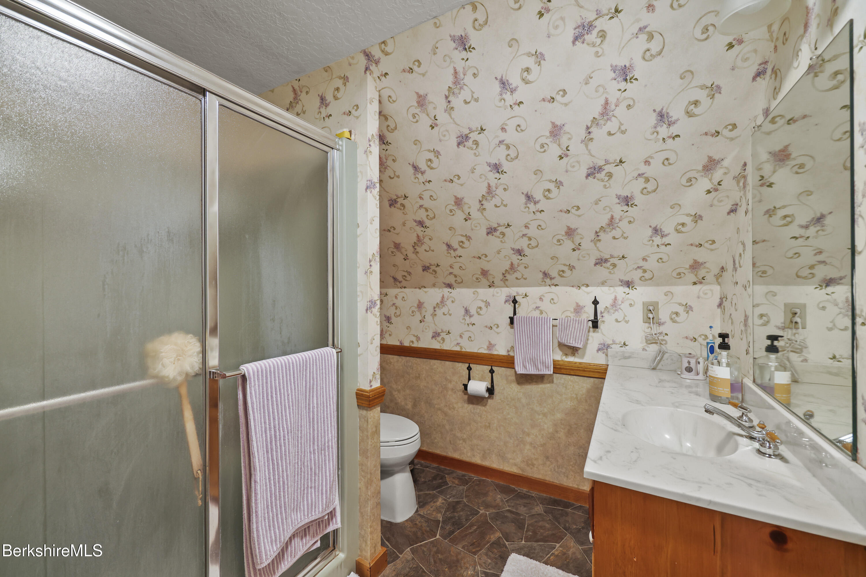 135 East Street Lee, MA 01238 - Photo 31 of 49 a bathroom with a sink and a mirror