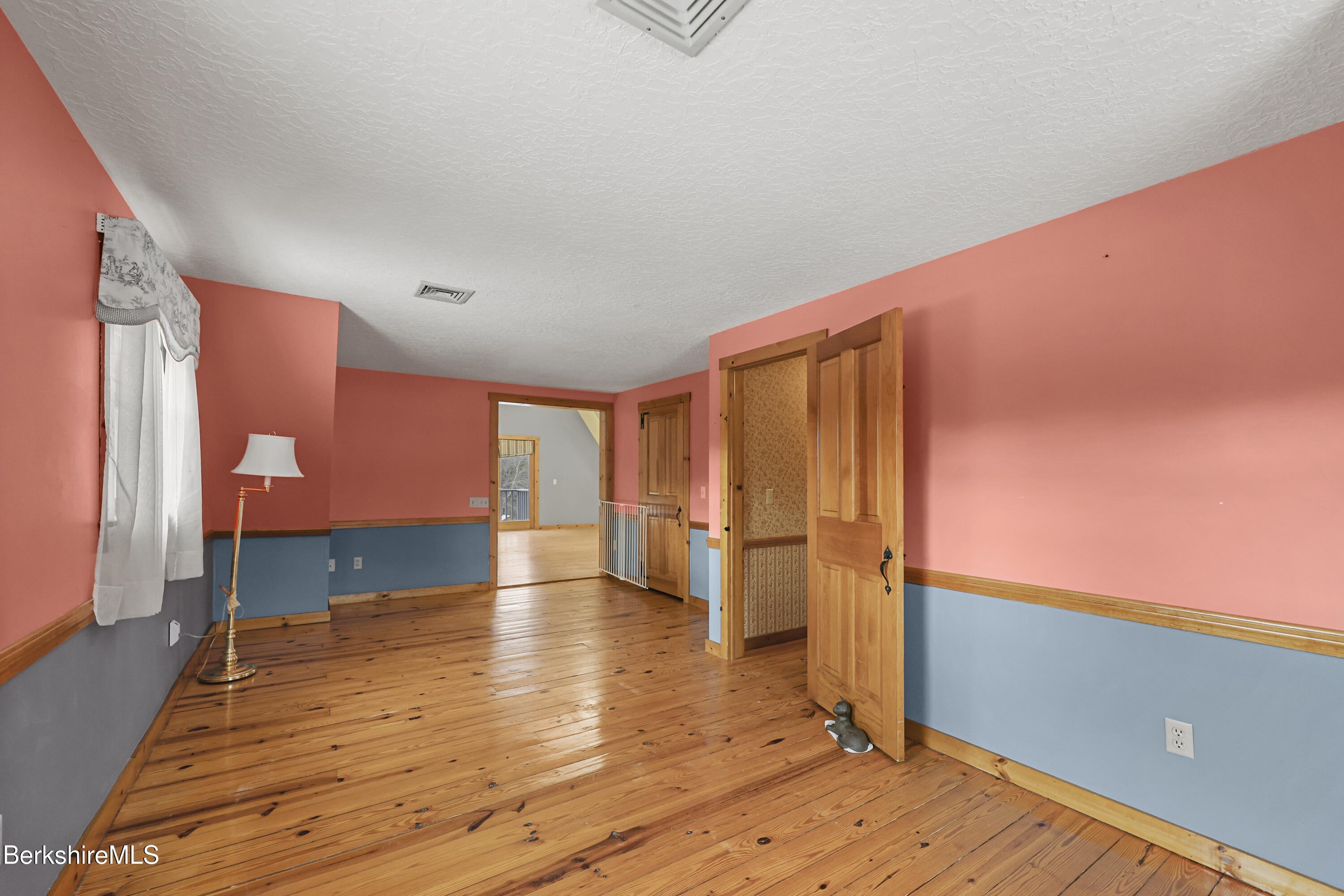 135 East Street Lee, MA 01238 - Photo 34 of 49 a view of empty room with wooden floor