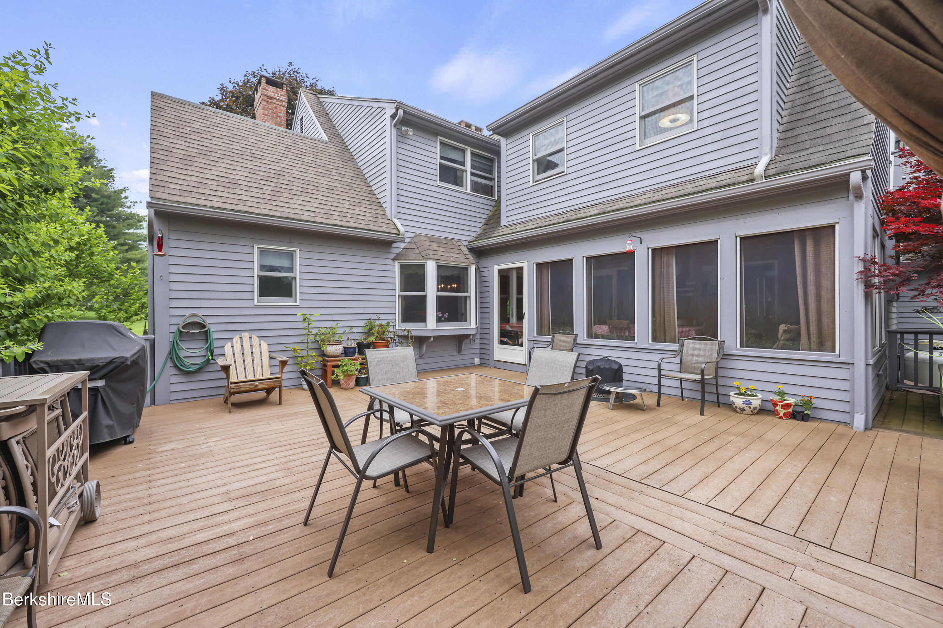 135 East Street Lee, MA 01238 - Photo 40 of 49 a view of a house with a patio and wooden flooring