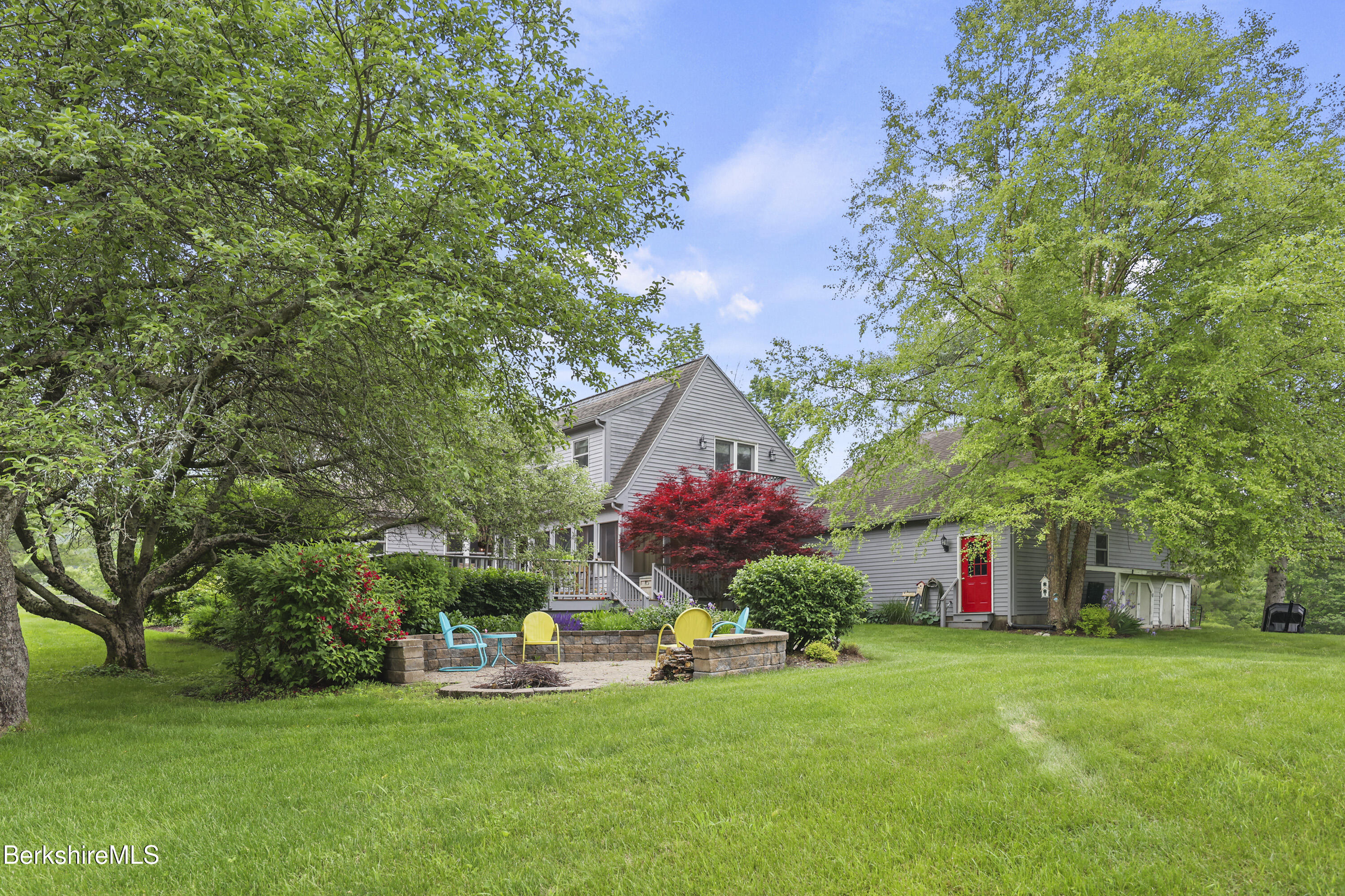 135 East Street Lee, MA 01238 - Photo 42 of 49 a childrens park with lots of swings and slides