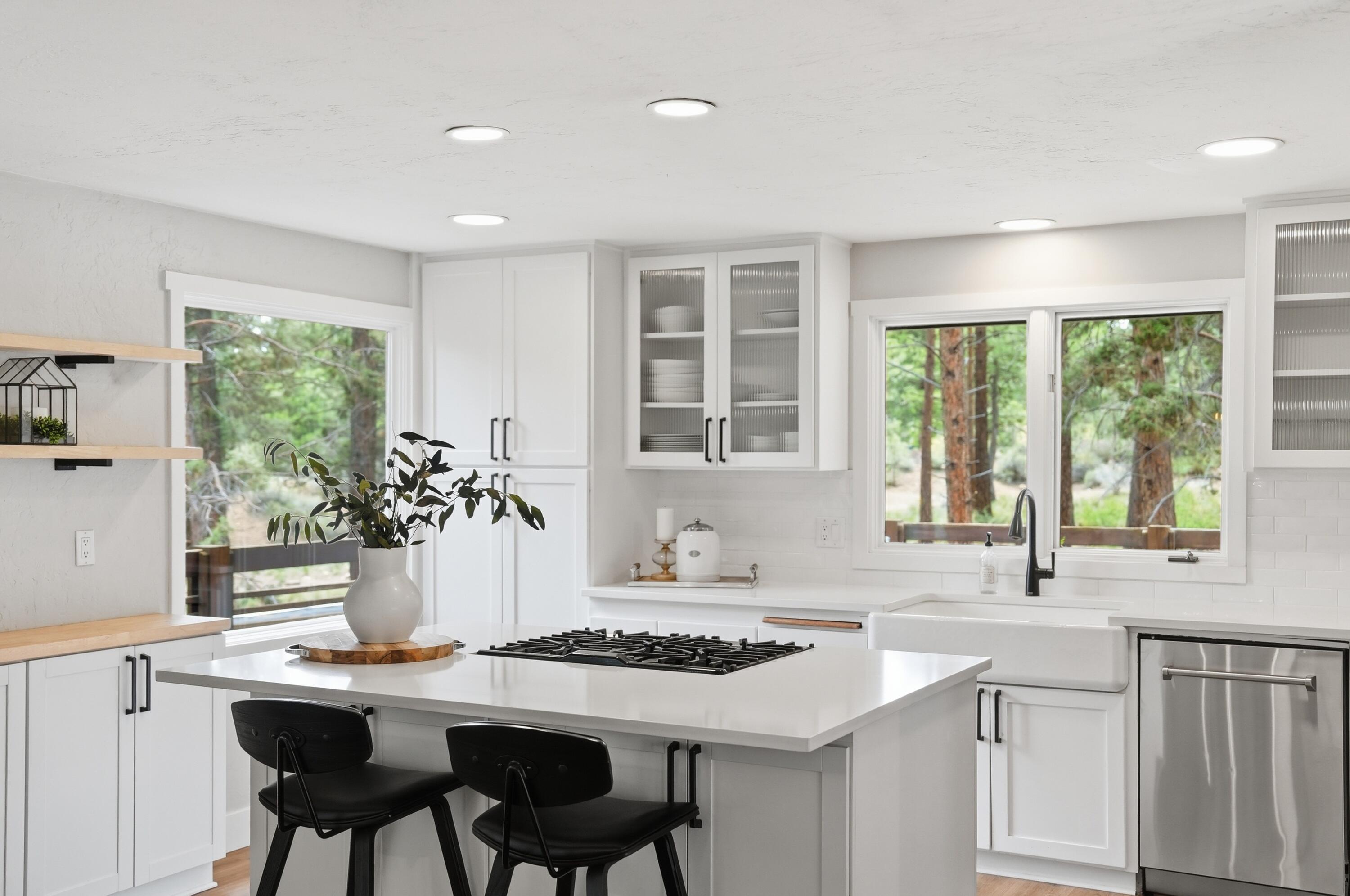 1961 Southwest Knoll Avenue Bend, OR 97702 - Photo 11 of 53 a kitchen with a table chairs sink and cabinets