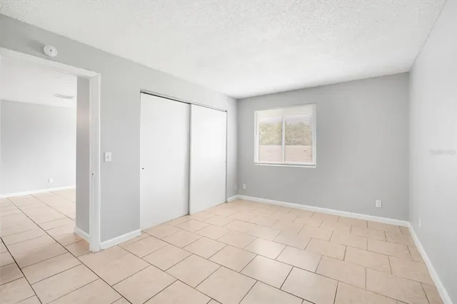 a view of an empty room with window