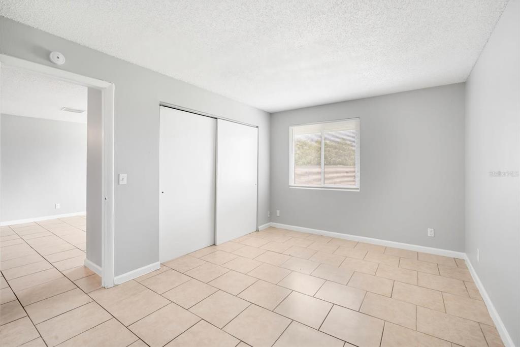 239 Red Maple Place Brandon, FL 33510 - Photo 14 of 20 a view of an empty room with window