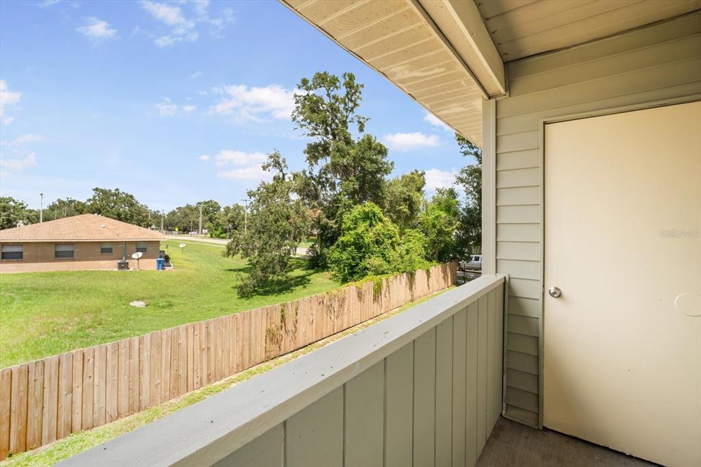239 Red Maple Place Brandon, FL 33510 - Photo 16 of 20 a view of a garden from a balcony