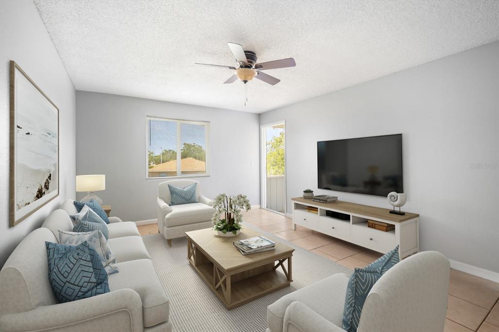 239 Red Maple Place Brandon, FL 33510 - Photo 4 of 18 a living room with furniture and a flat screen tv
