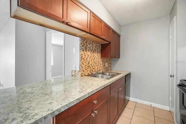 a view of kitchen island with wooden floor