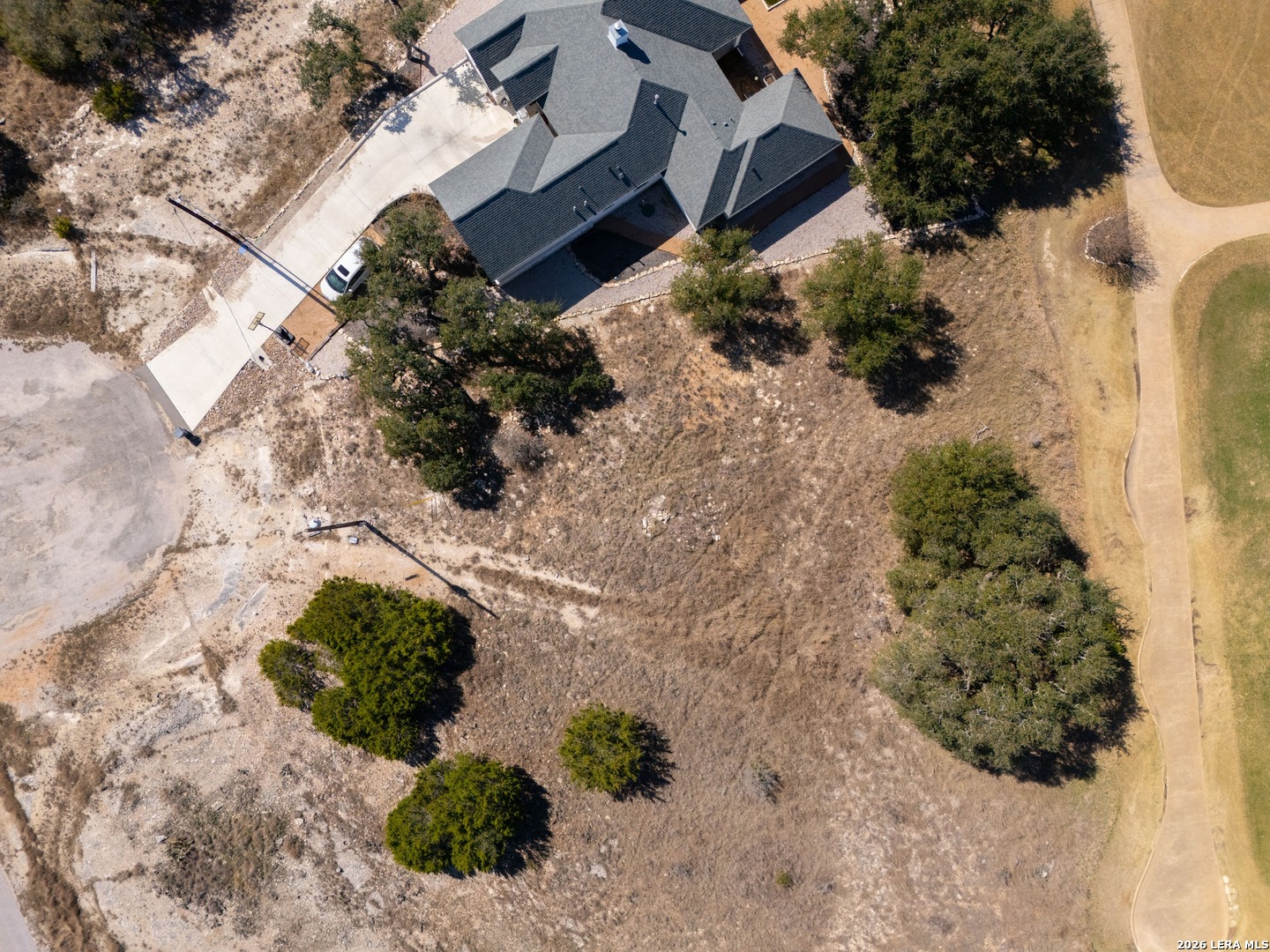 425 George Dolson Blanco, TX 78606 - Photo 2 of 27 a view of a garden with plants