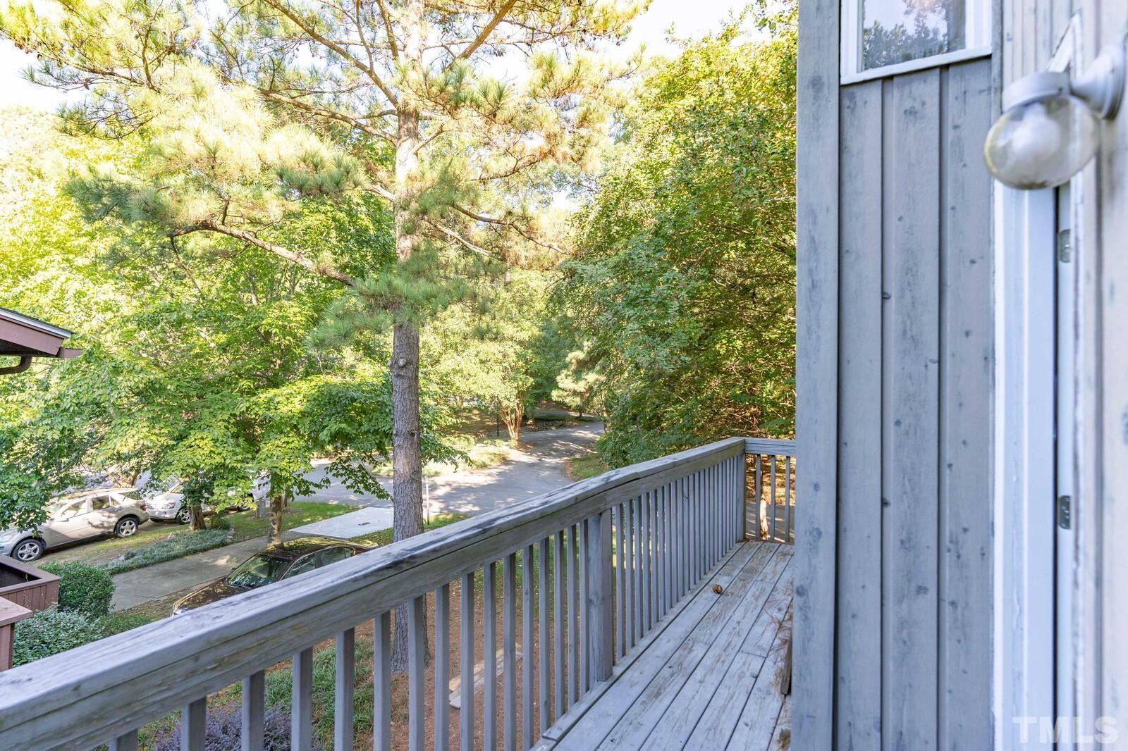 4353 Sunscape Lane Raleigh, NC 27613 - Photo 21 of 30 a view of a balcony with wooden floor