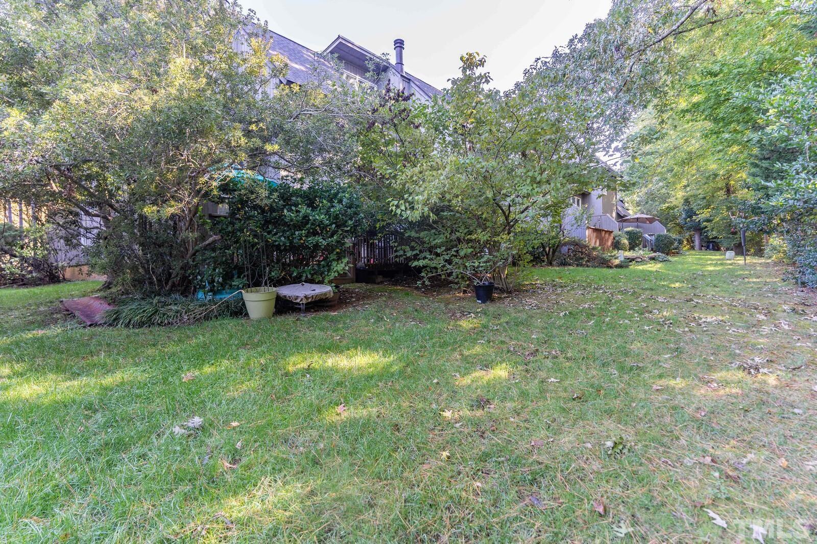 4353 Sunscape Lane Raleigh, NC 27613 - Photo 28 of 30 a front view of a house with a yard and tree s