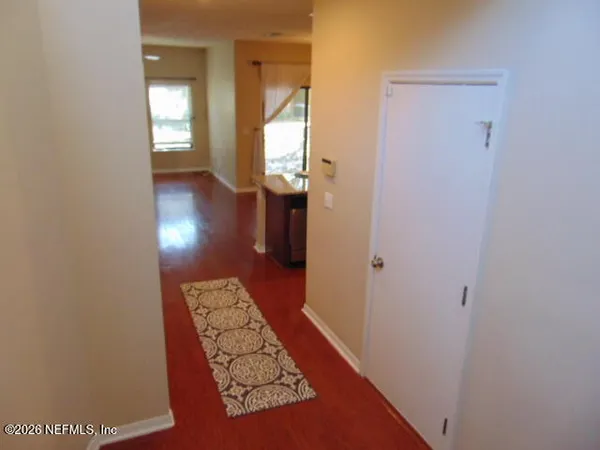 view of an entryway with wooden floor