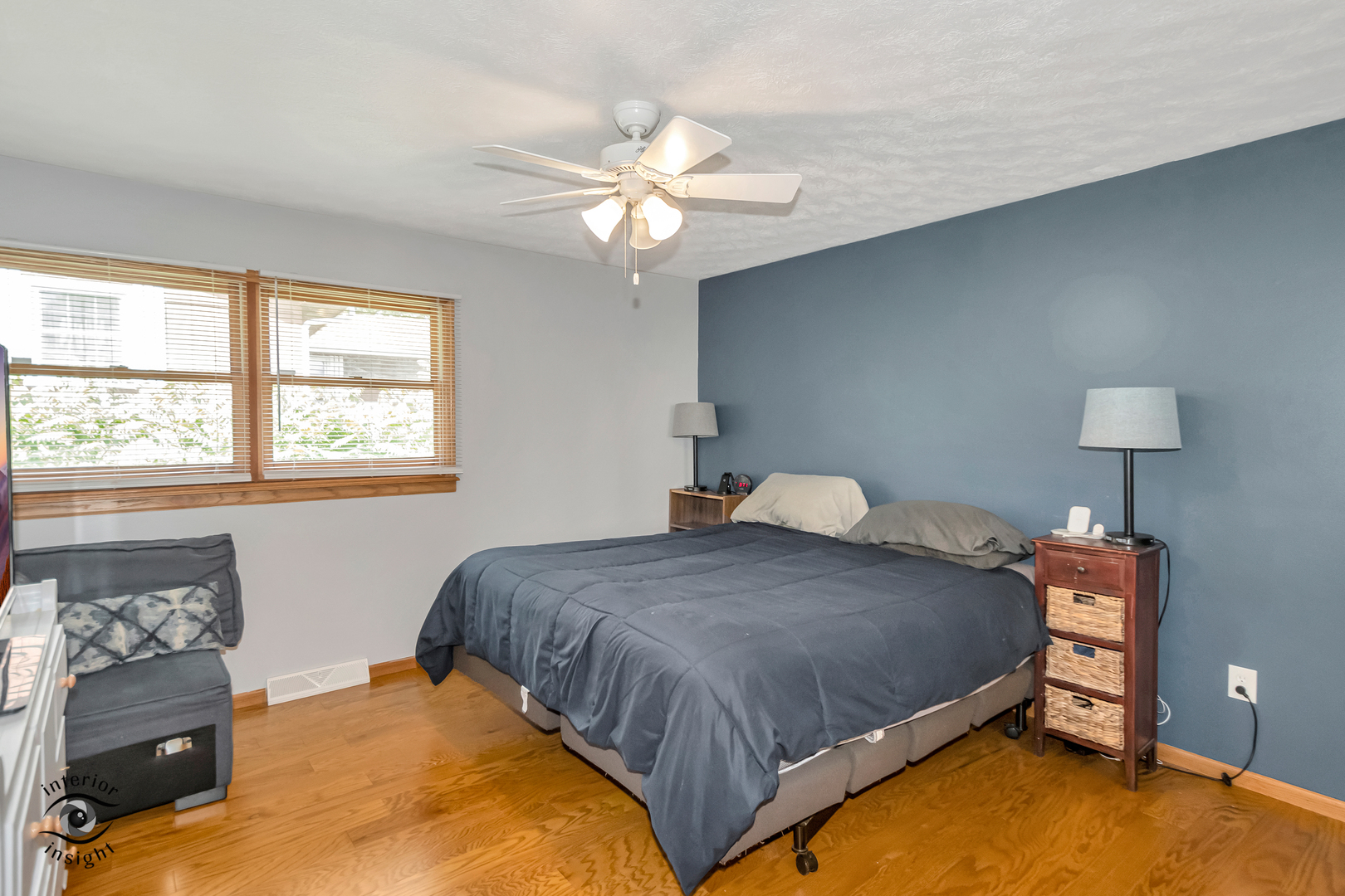 24158 Marble Road Channahon, IL 60410 - Photo 14 of 26 a bedroom with a bed and a chandelier