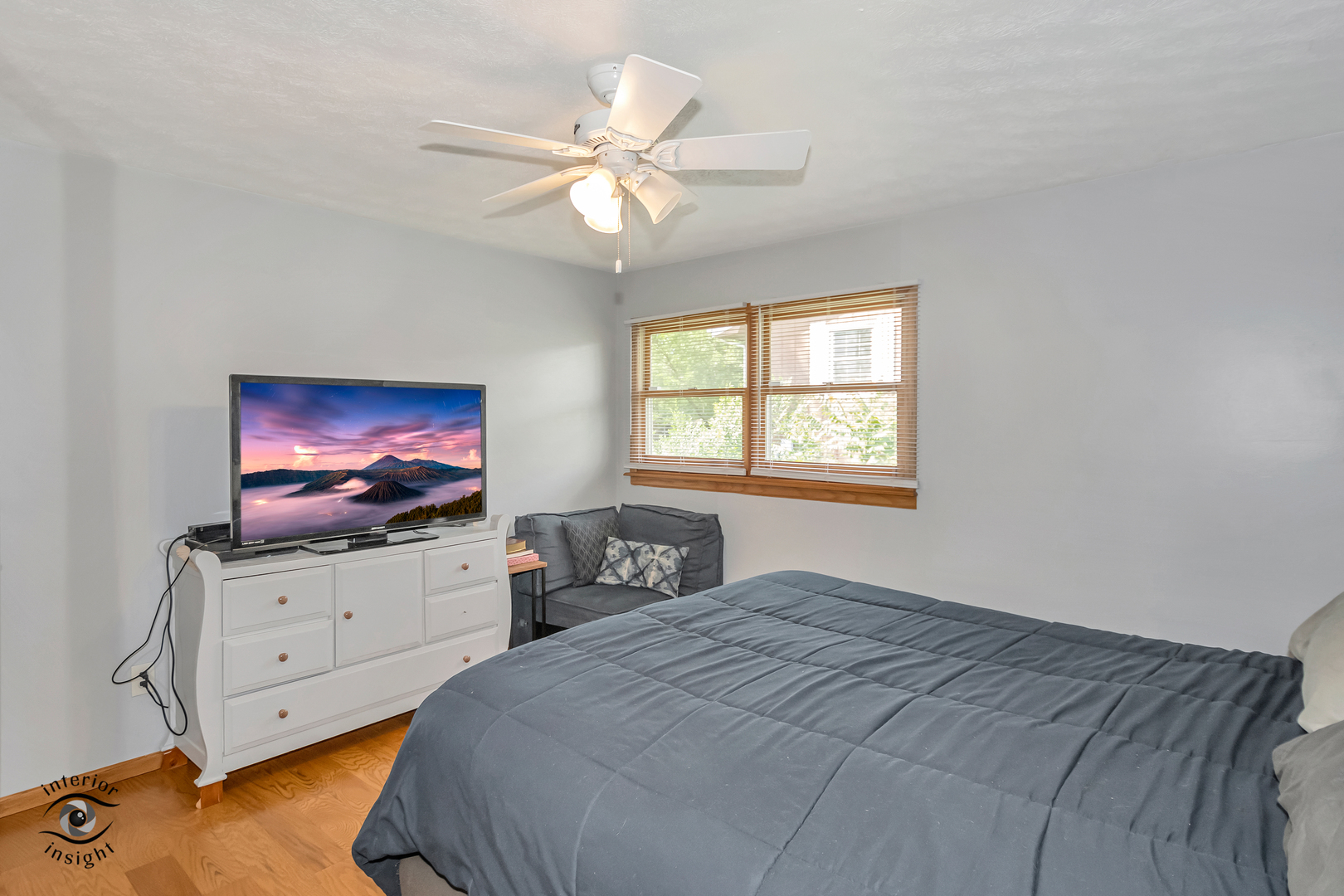 24158 Marble Road Channahon, IL 60410 - Photo 15 of 26 a bedroom with a bed and a flat screen tv
