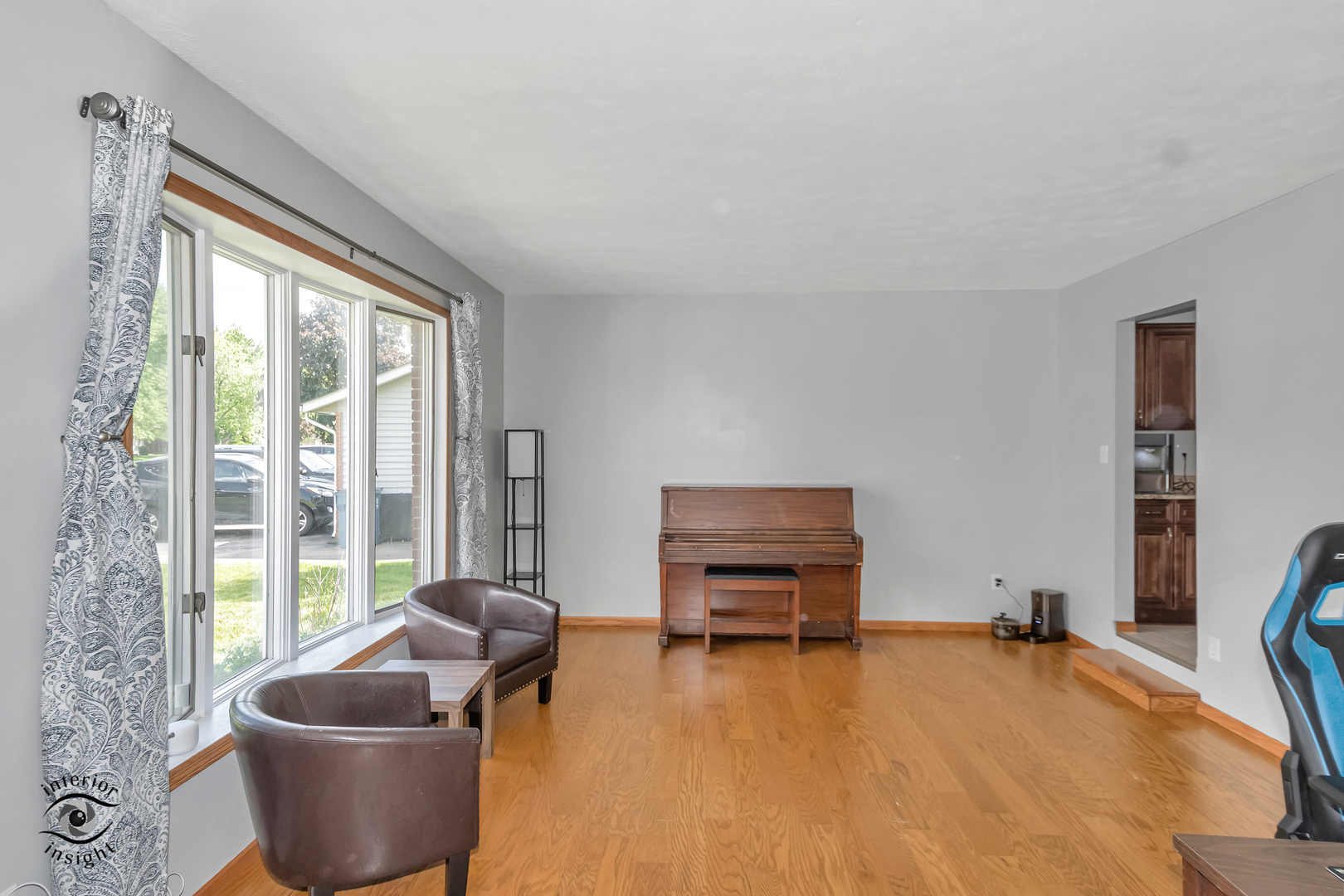 24158 Marble Road Channahon, IL 60410 - Photo 5 of 26 a living room with furniture and a flat screen tv