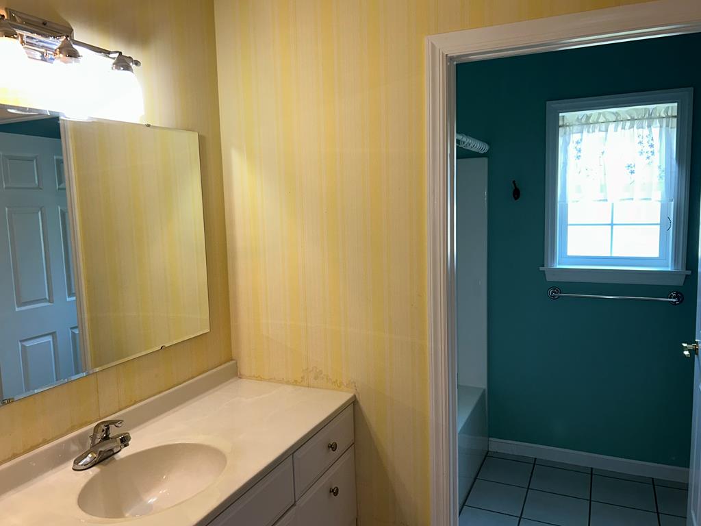 114 Oak Ridge Drive Clarion, PA 16214 - Photo 29 of 38 a bathroom with a sink and a mirror