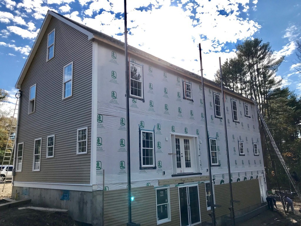 22 Tracywood Road Canton, MA 02021 - Photo 13 of 28 a large brick building with a large windows