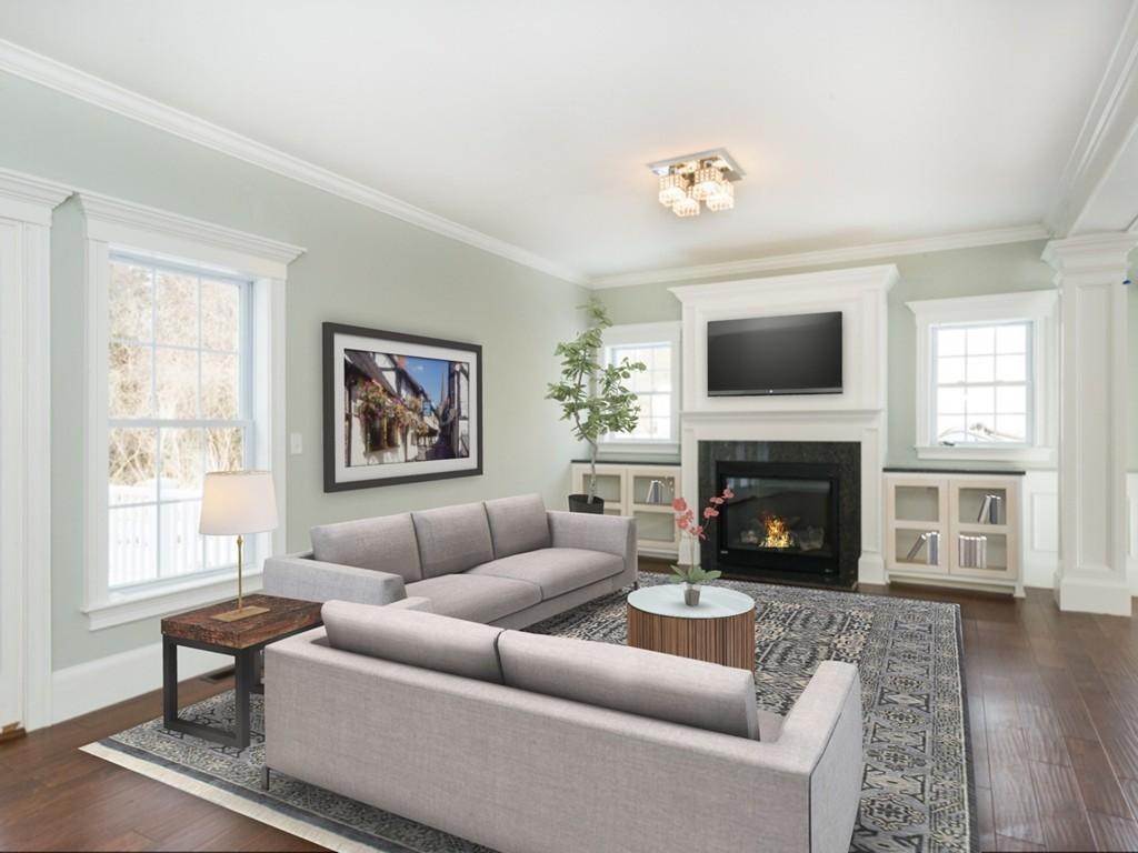 22 Tracywood Road Canton, MA 02021 - Photo 5 of 28 a living room with furniture a fireplace and a flat screen tv