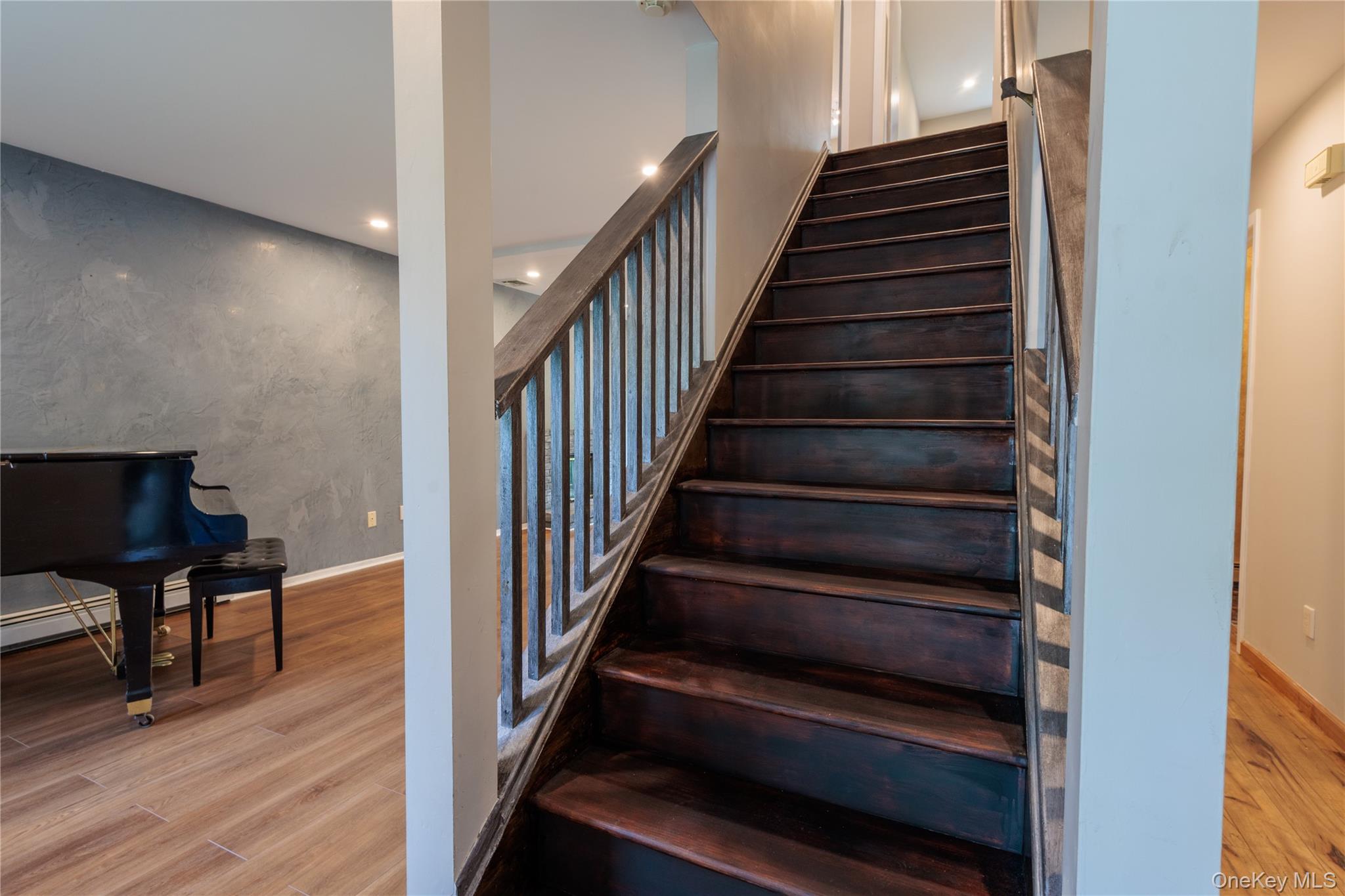 14 Hill Road St. James, NY 11780 - Photo 13 of 29 a view of entryway and hall with wooden floor