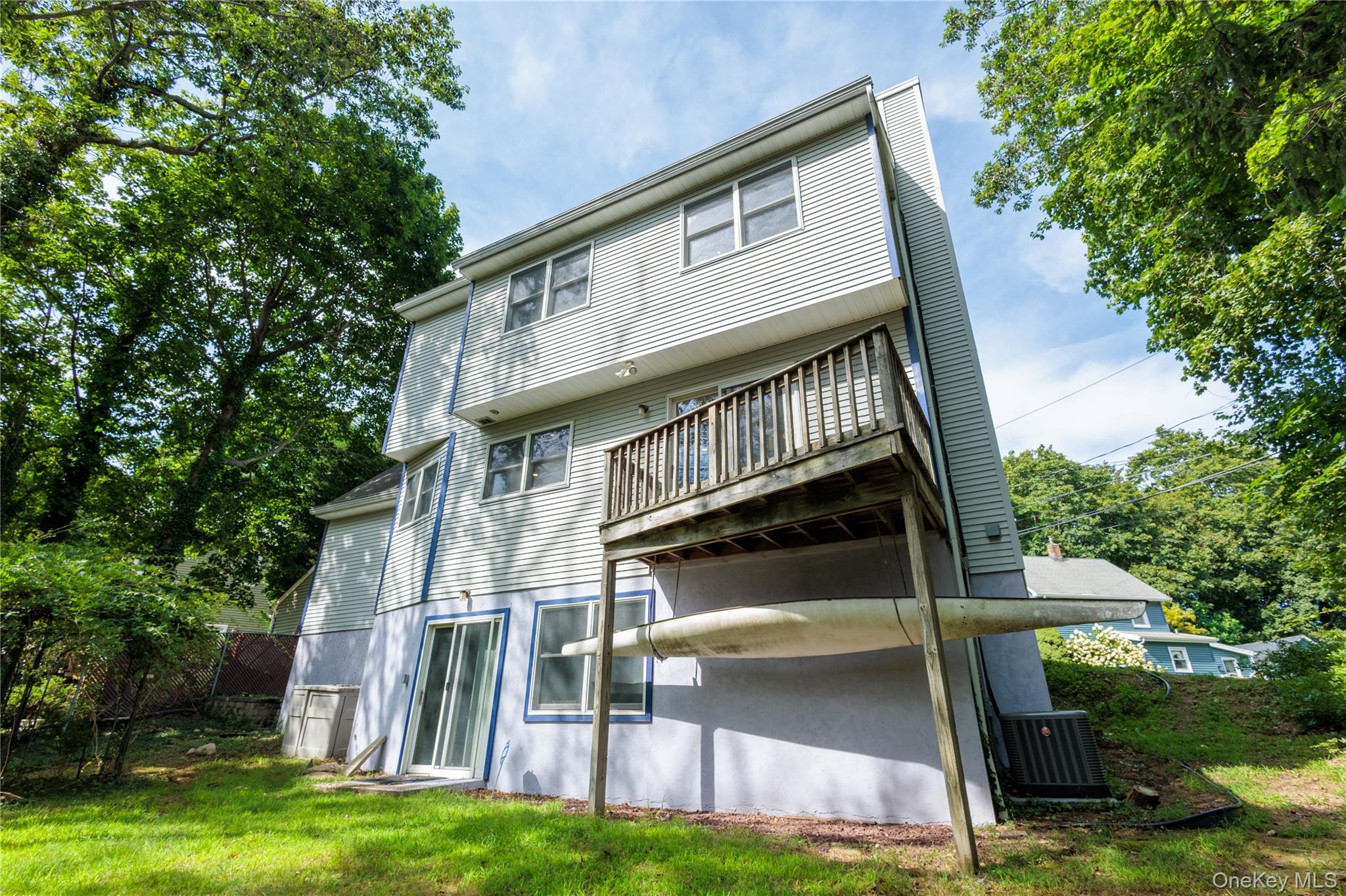 14 Hill Road St. James, NY 11780 - Photo 28 of 29 a view of a house with backyard