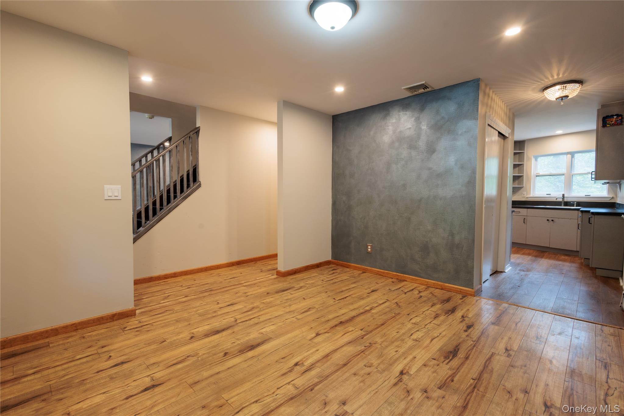 14 Hill Road St. James, NY 11780 - Photo 8 of 29 a view of a kitchen from a hallway