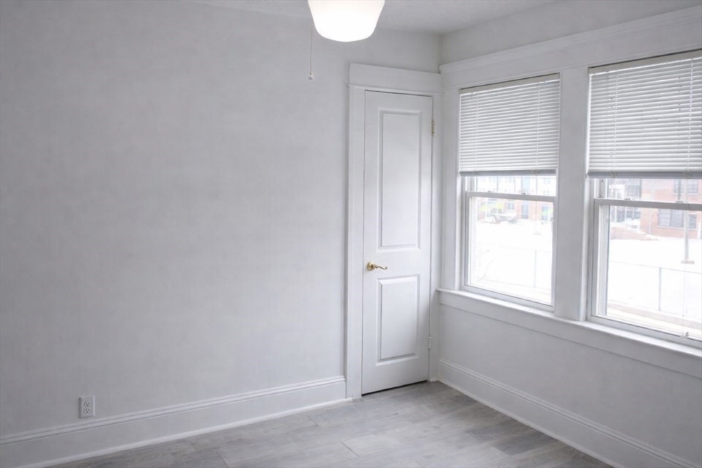 144 Washington Street Springfield, MA 01108 - Photo 14 of 18 an empty room with windows