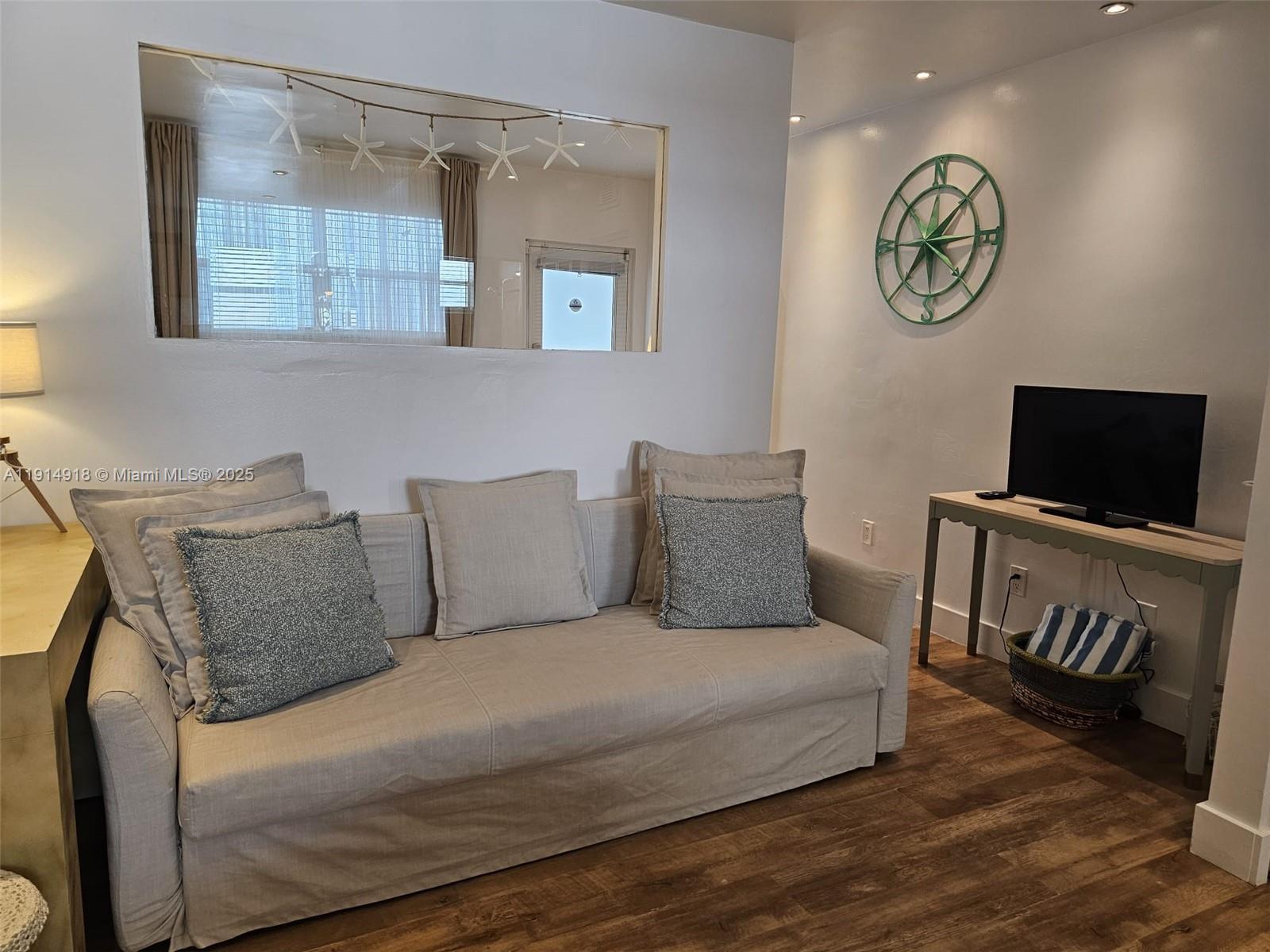 751 Collins Avenue, Unit 3 Miami Beach, FL 33139 - Photo 16 of 35 a large white bed in a white room