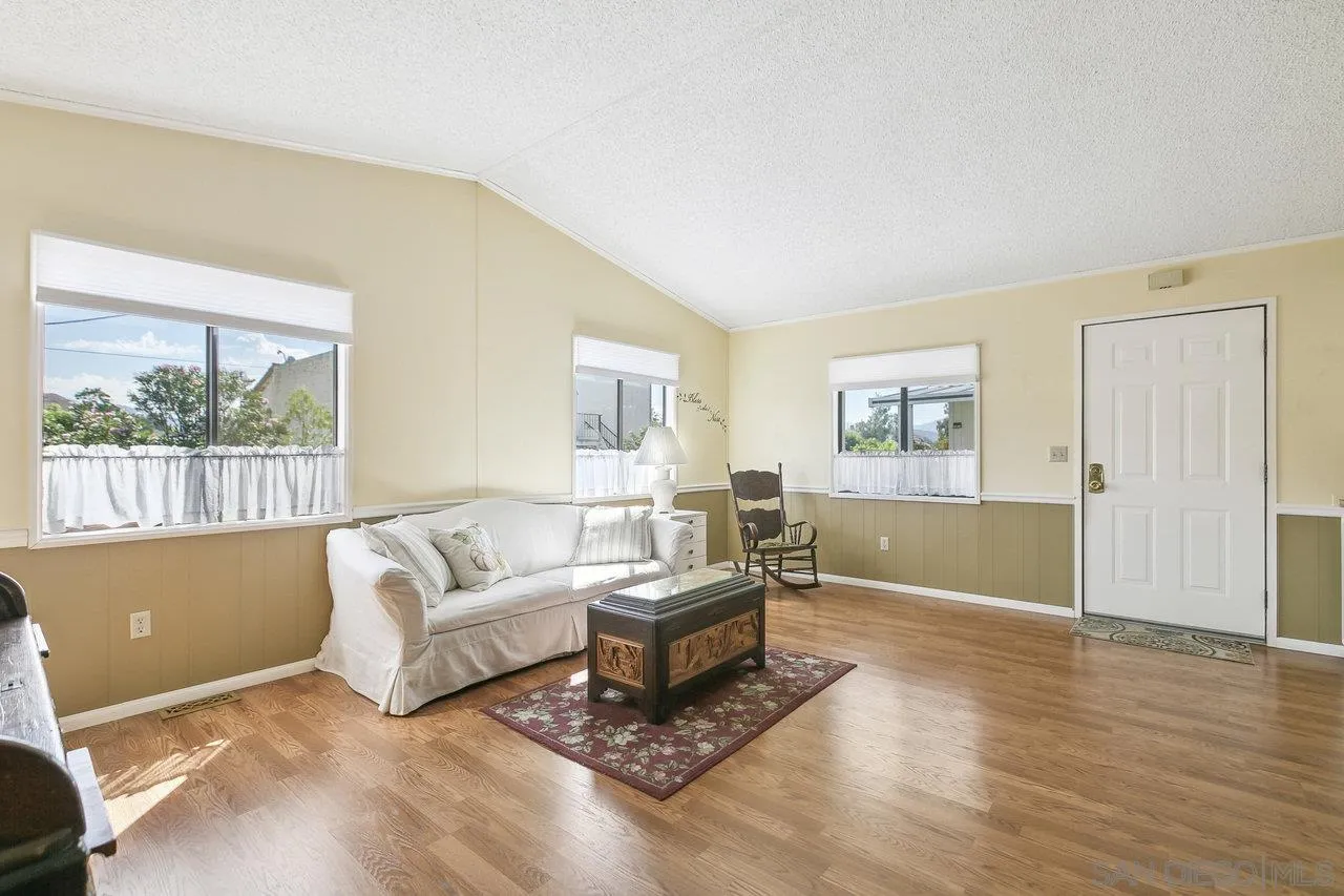 11949 Riverside Drive, Unit SPC 8 Lakeside, CA 92040 - Photo 11 of 29 a living room with furniture and a window