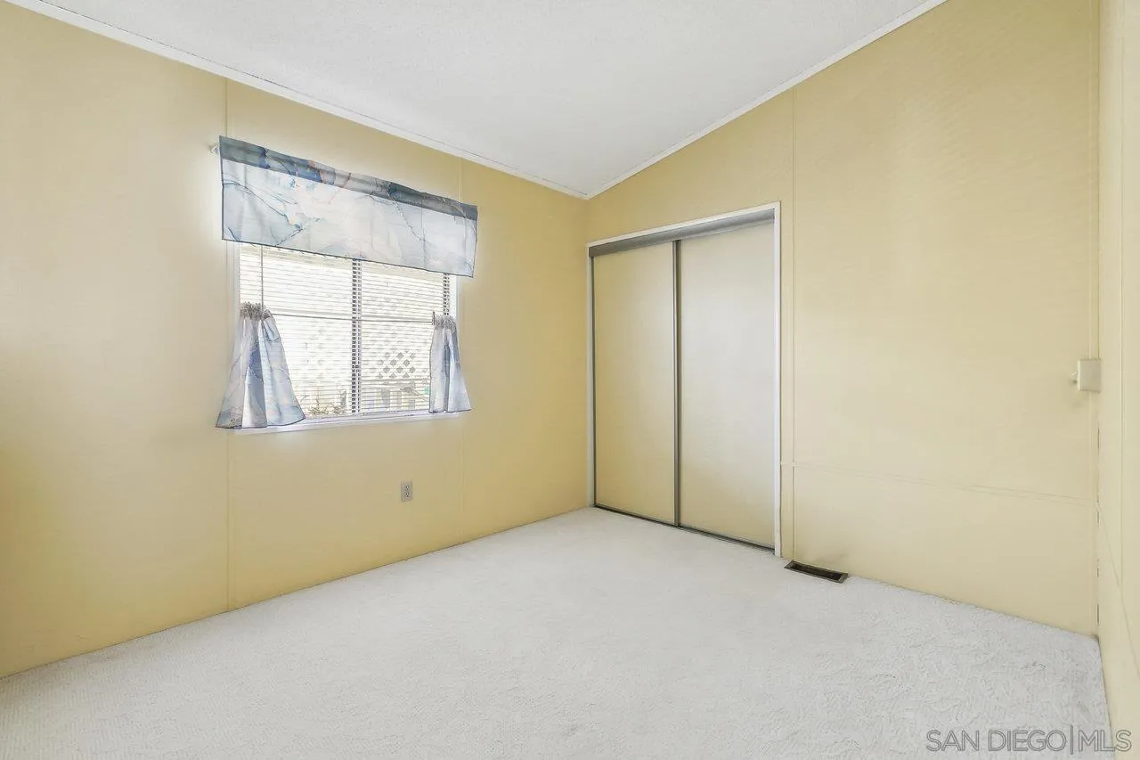 11949 Riverside Drive, Unit SPC 8 Lakeside, CA 92040 - Photo 13 of 29 an empty room with windows