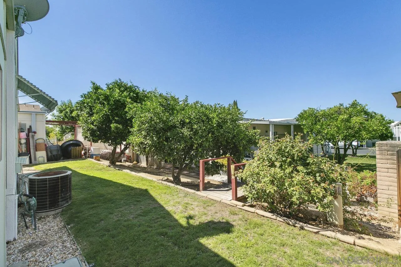 11949 Riverside Drive, Unit SPC 8 Lakeside, CA 92040 - Photo 20 of 29 a view of a backyard with sitting area