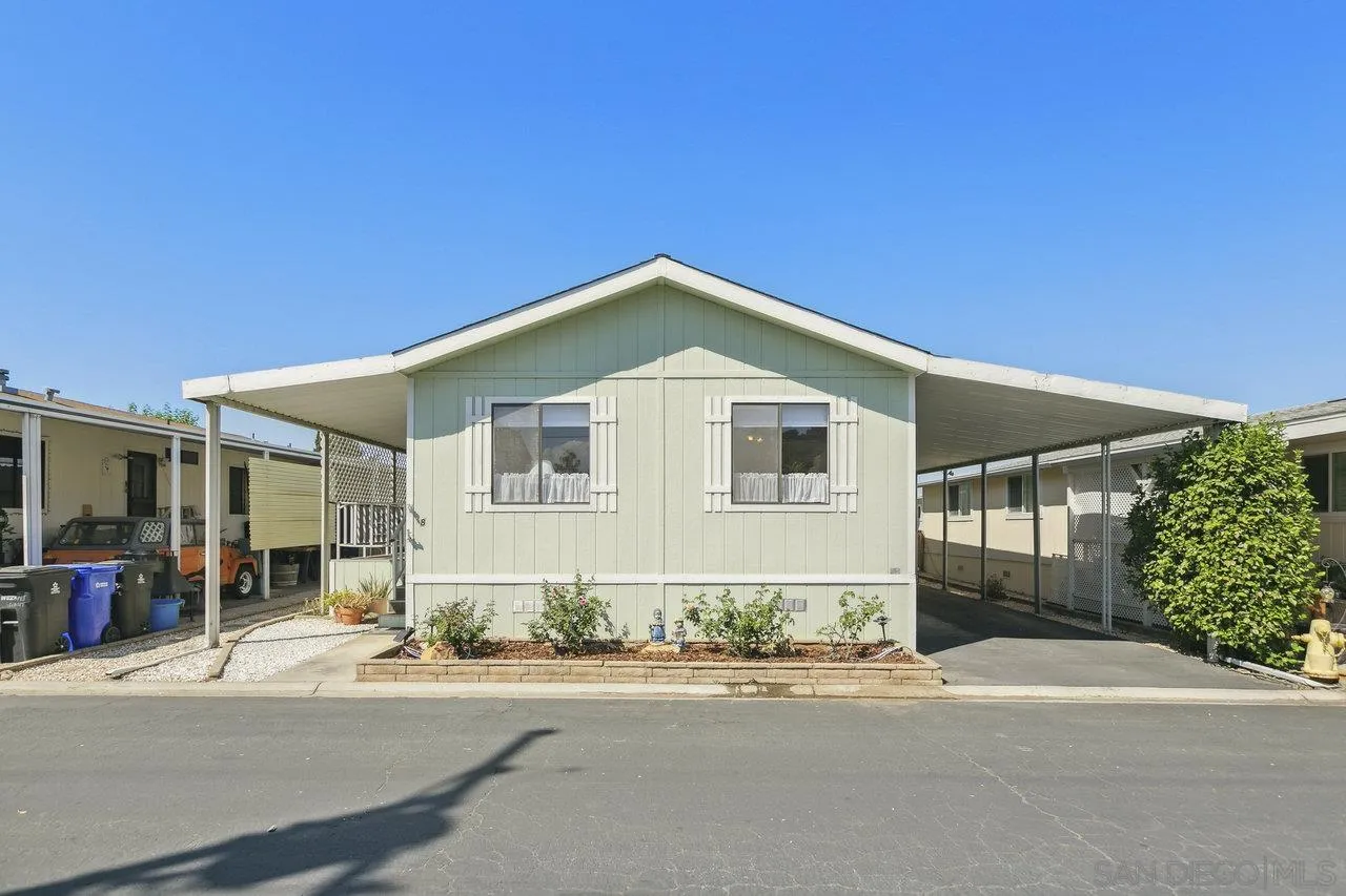11949 Riverside Drive, Unit SPC 8 Lakeside, CA 92040 - Photo 2 of 29 a front view of a house with a yard