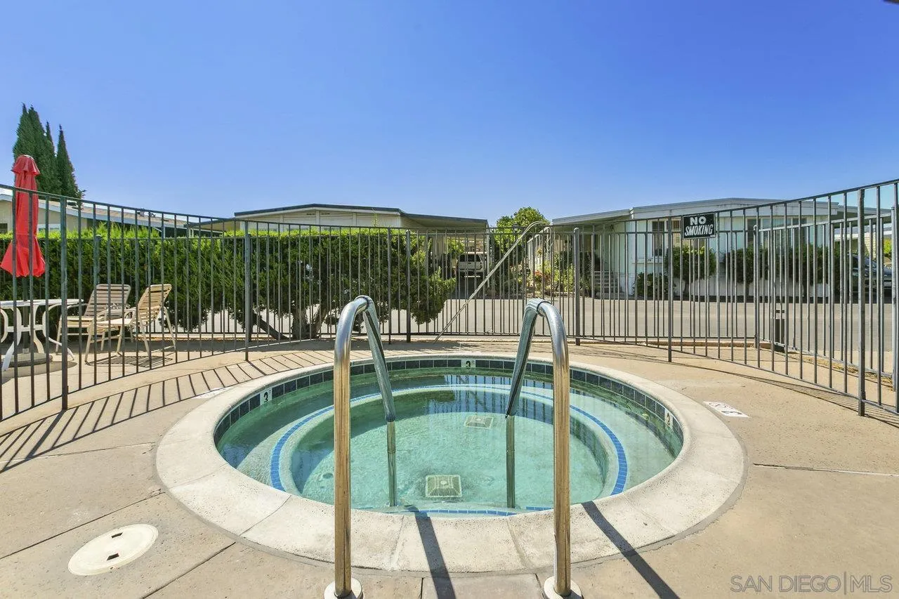 11949 Riverside Drive, Unit SPC 8 Lakeside, CA 92040 - Photo 27 of 29 a view of a swimming pool with a patio