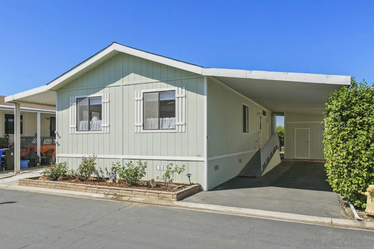 11949 Riverside Drive, Unit SPC 8 Lakeside, CA 92040 - Photo 3 of 29 front view of a house with a yard