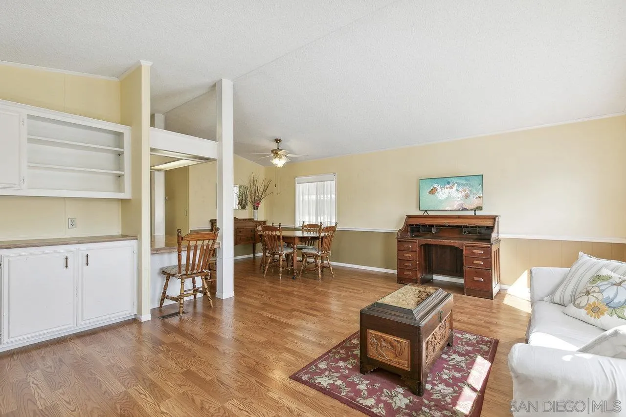 11949 Riverside Drive, Unit SPC 8 Lakeside, CA 92040 - Photo 9 of 29 a living room with furniture and a fireplace