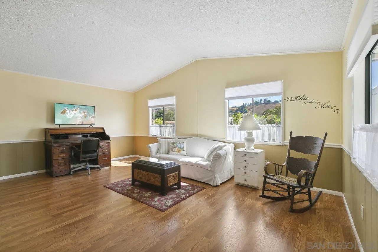 11949 Riverside Drive, Unit SPC 8 Lakeside, CA 92040 - Photo 10 of 29 a living room with furniture and a wooden floor