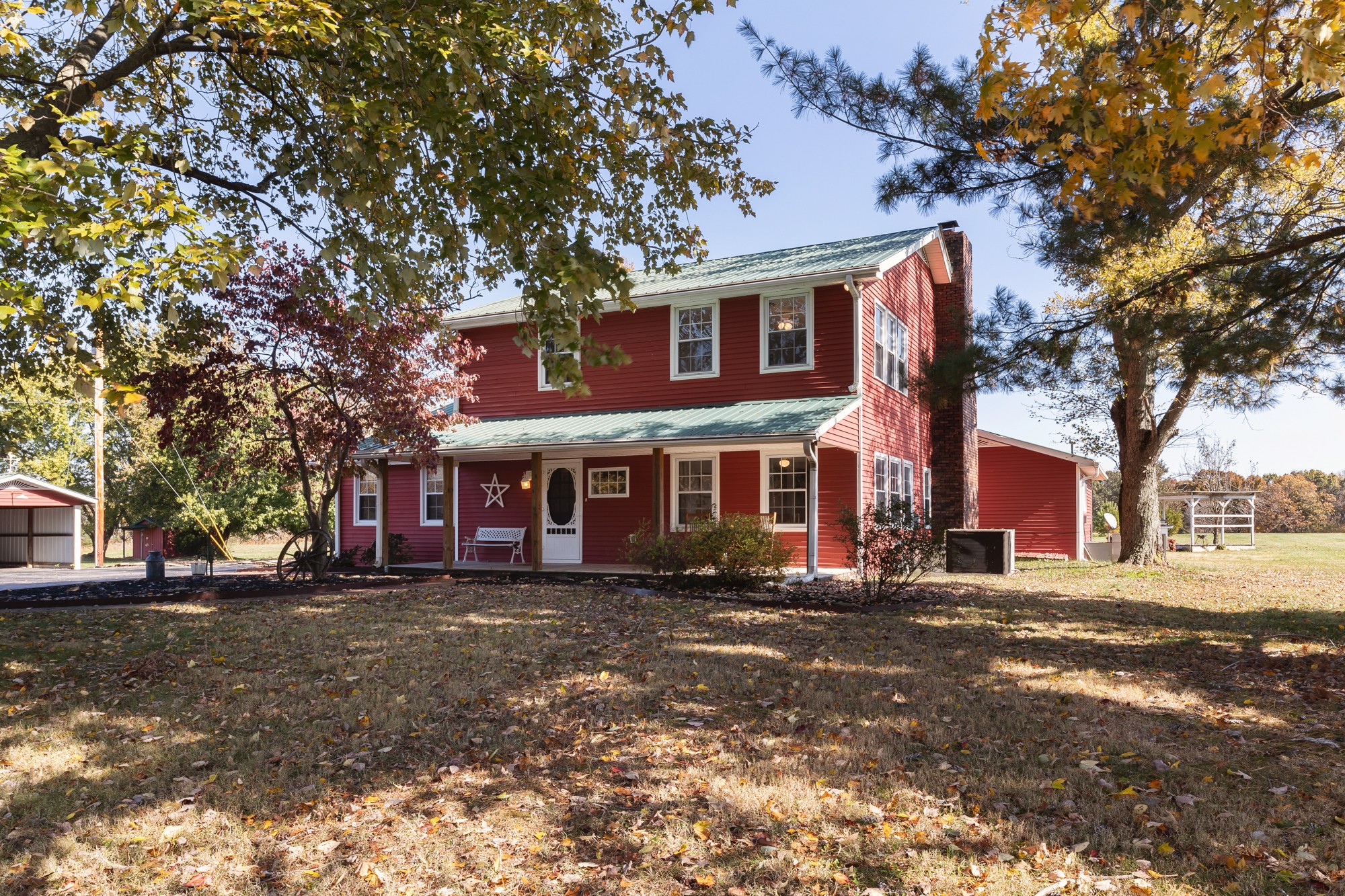 2341 Gideon Road Greenbrier, TN 37073 - Photo 2 of 30 a view of a big house with a big yard and large trees