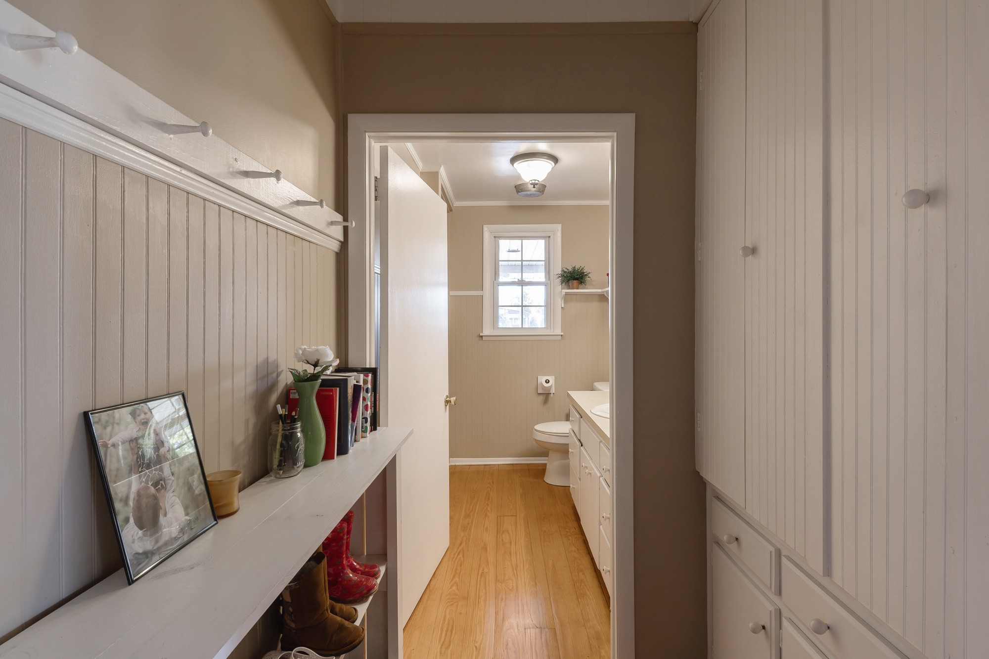 2341 Gideon Road Greenbrier, TN 37073 - Photo 17 of 30 a view of a hallway with wooden floor and furniture
