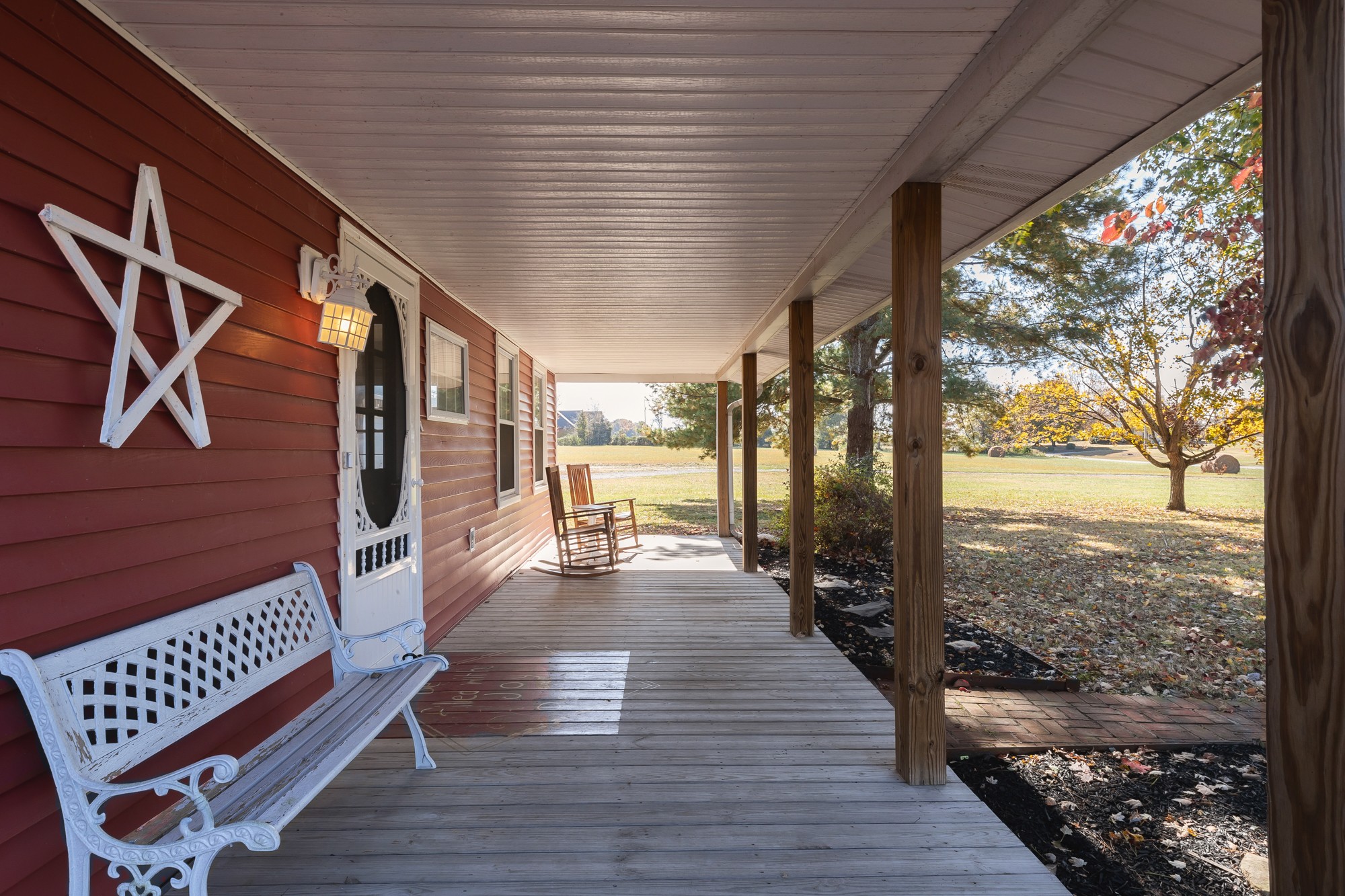 2341 Gideon Road Greenbrier, TN 37073 - Photo 3 of 30 a view of a porch with wooden floor