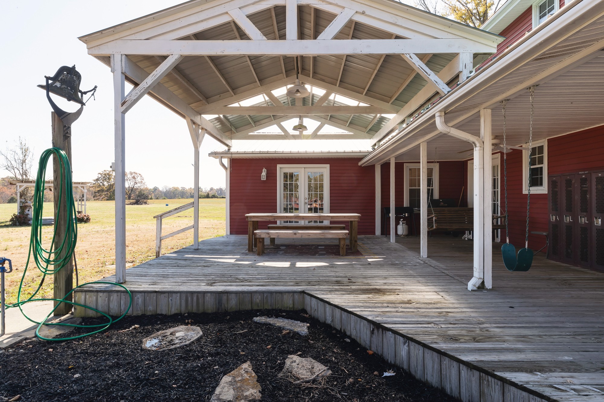 2341 Gideon Road Greenbrier, TN 37073 - Photo 5 of 30 a view of a porch with furniture and a floor to ceiling window