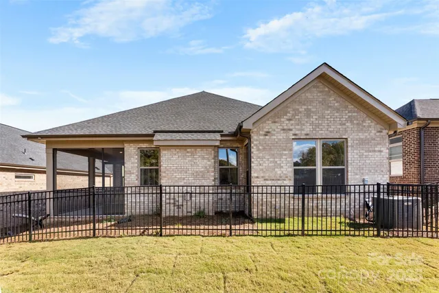 a view of a house with a swimming pool
