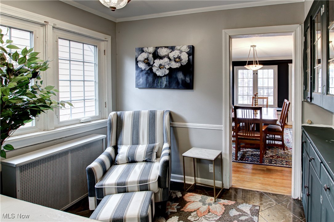 17800 Winslow Road Beachwood, OH 44122 - Photo 8 of 31 Sitting room featuring dark hardwood / wood-style floors, crown molding, and radiator