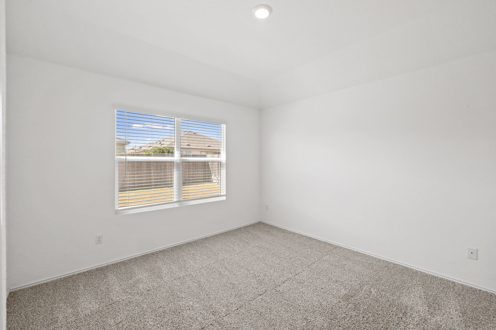 110 Madrid Kyle, TX 78640 - Photo 14 of 29 an empty room with a window