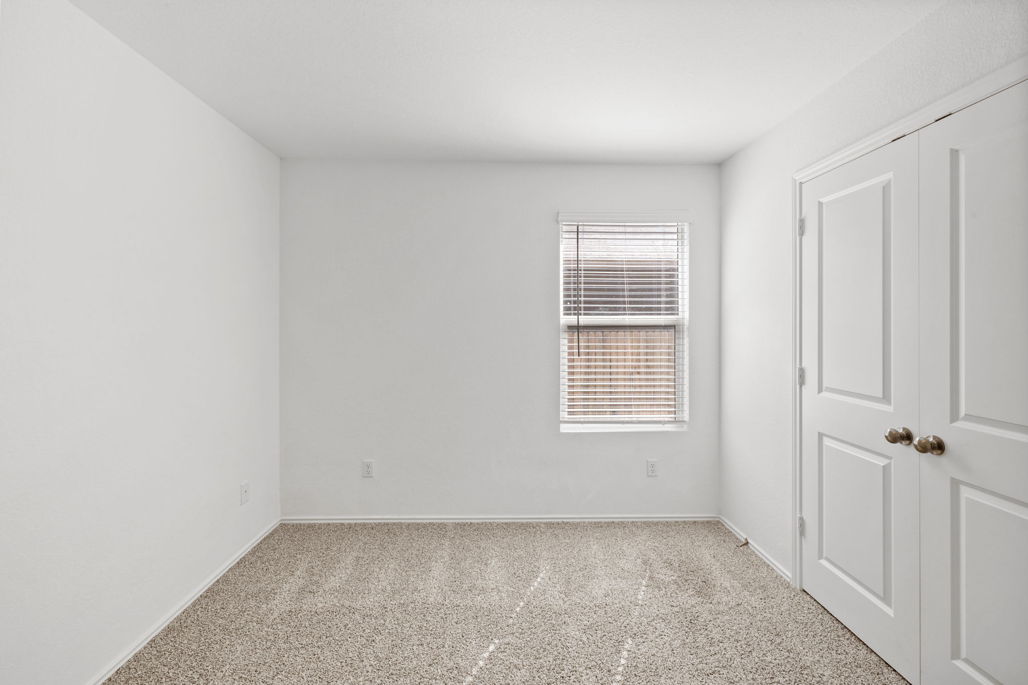 110 Madrid Kyle, TX 78640 - Photo 25 of 29 an empty room with windows