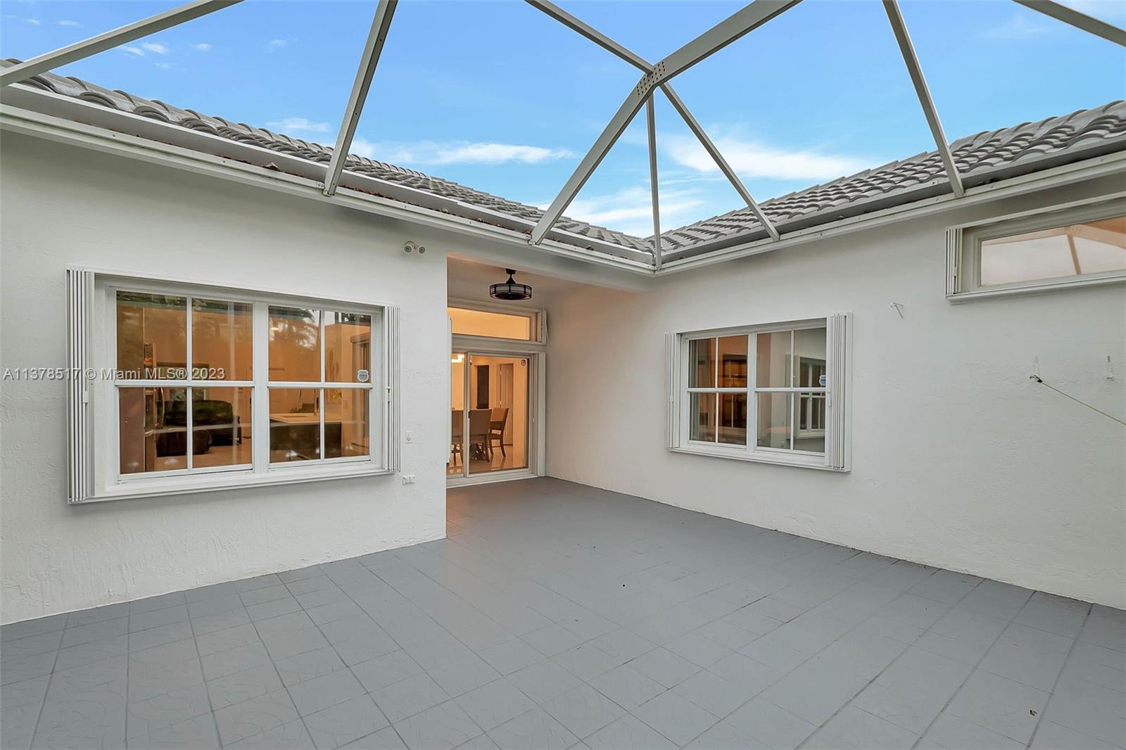 4115 Sabal Ridge Circle Weston, FL 33331 - Photo 16 of 31 a view of an empty room with a window